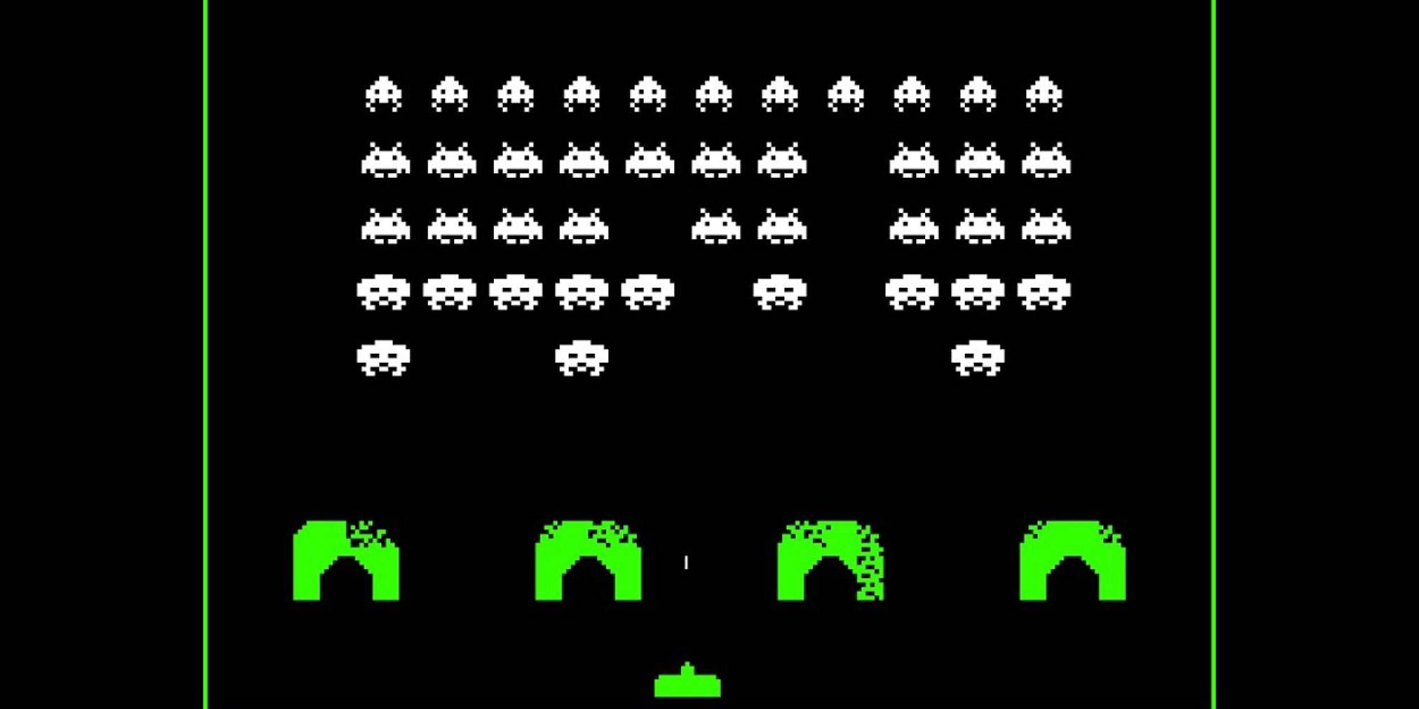 A black background punctuated with sprites including aliens and a spaceship from Space Invaders.