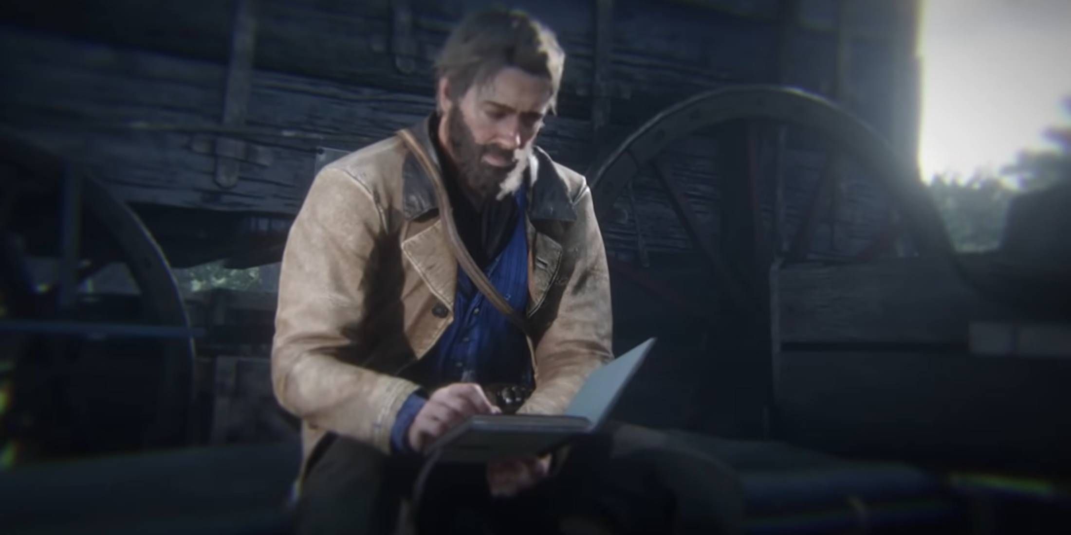 Arthur Morgan writing in his journal in Red Dead Redemption 2