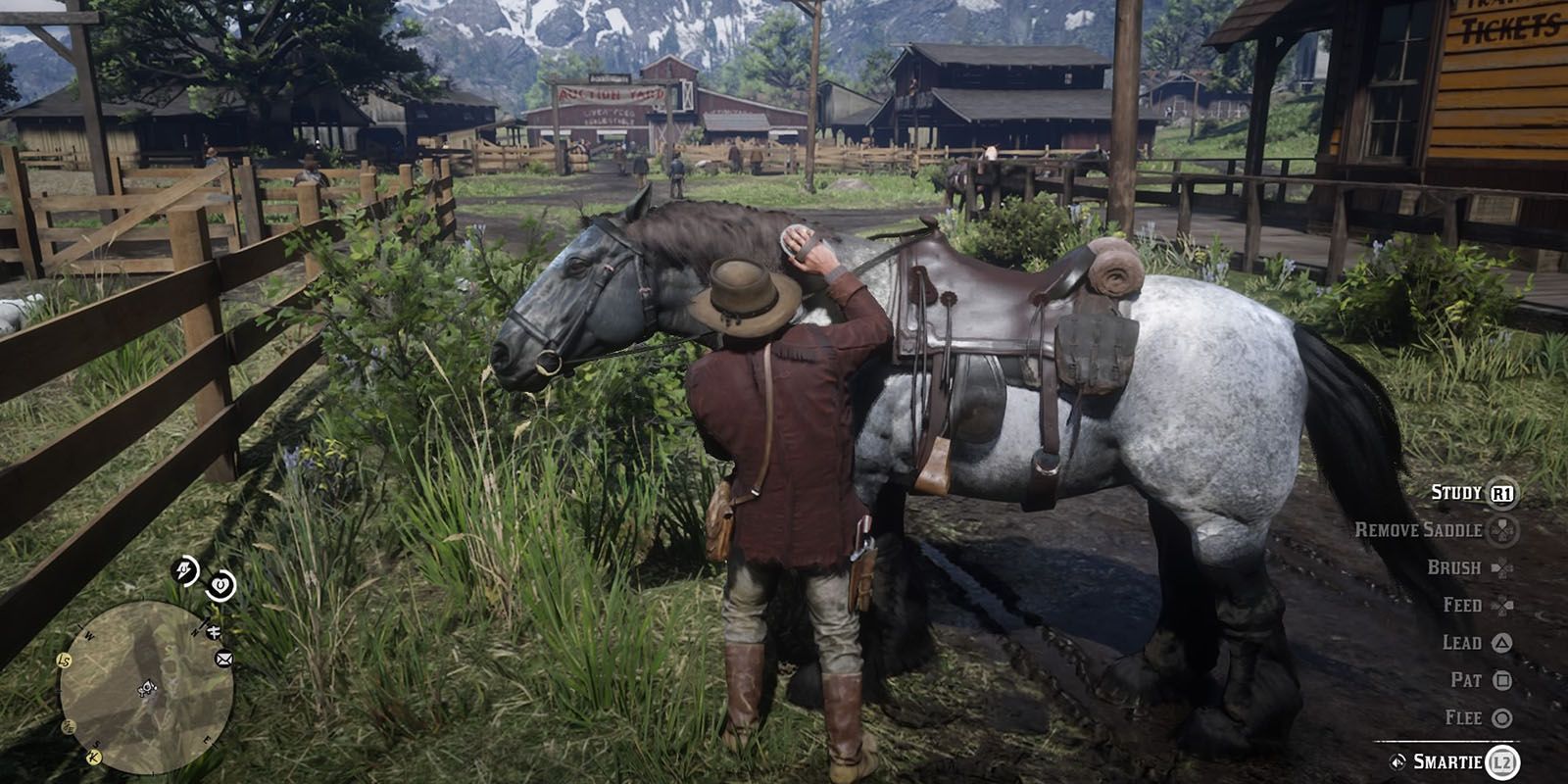 Arthur petting his horse in Red Dead Redemption 2