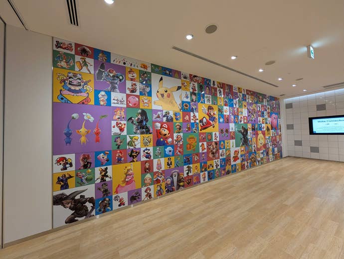 A mural of lots of different games from Nintendo's long game publishing history, at the Nintendo Museum.