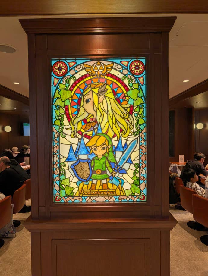 A stained glass window in the Nintendo Museum.