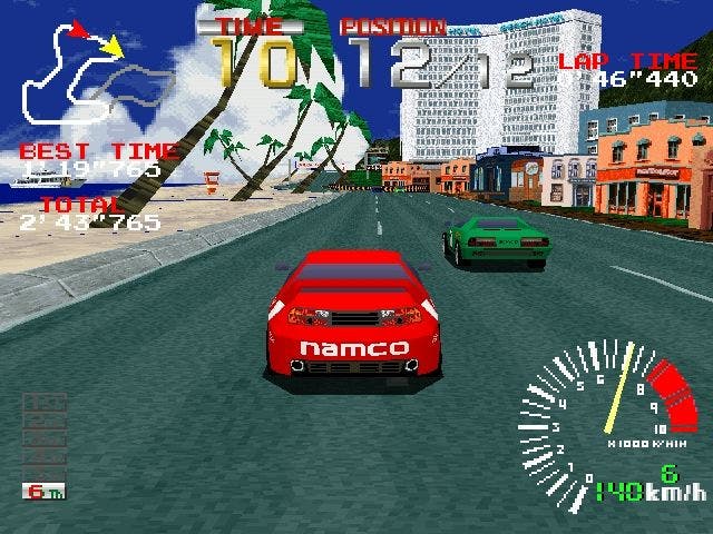 Ridge Racer PS1 screenshot showing a red car racing by the palm trees of a beach