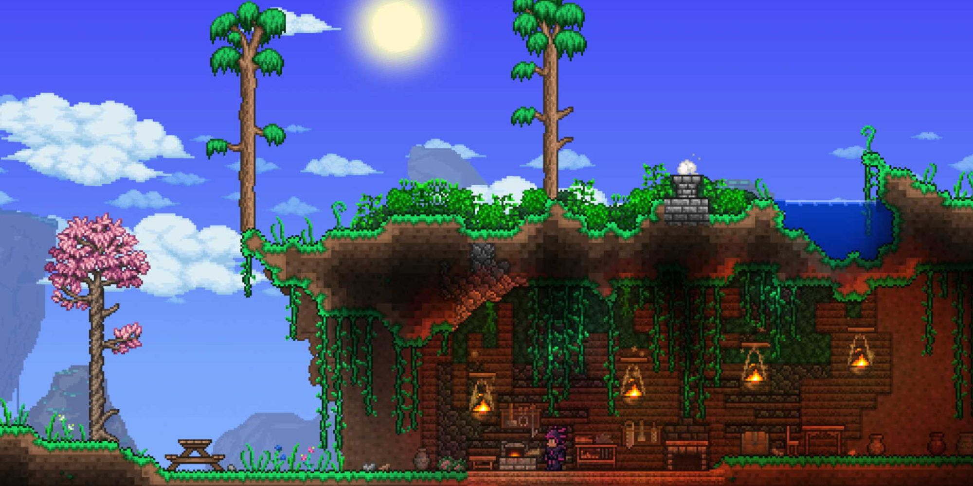 Terraria screenshot of a house built into the side of a cave.