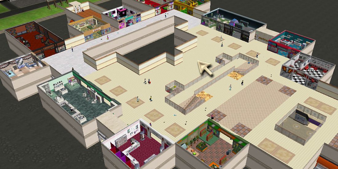 Small crowds wander through a mall in Mall Tycoon 2.