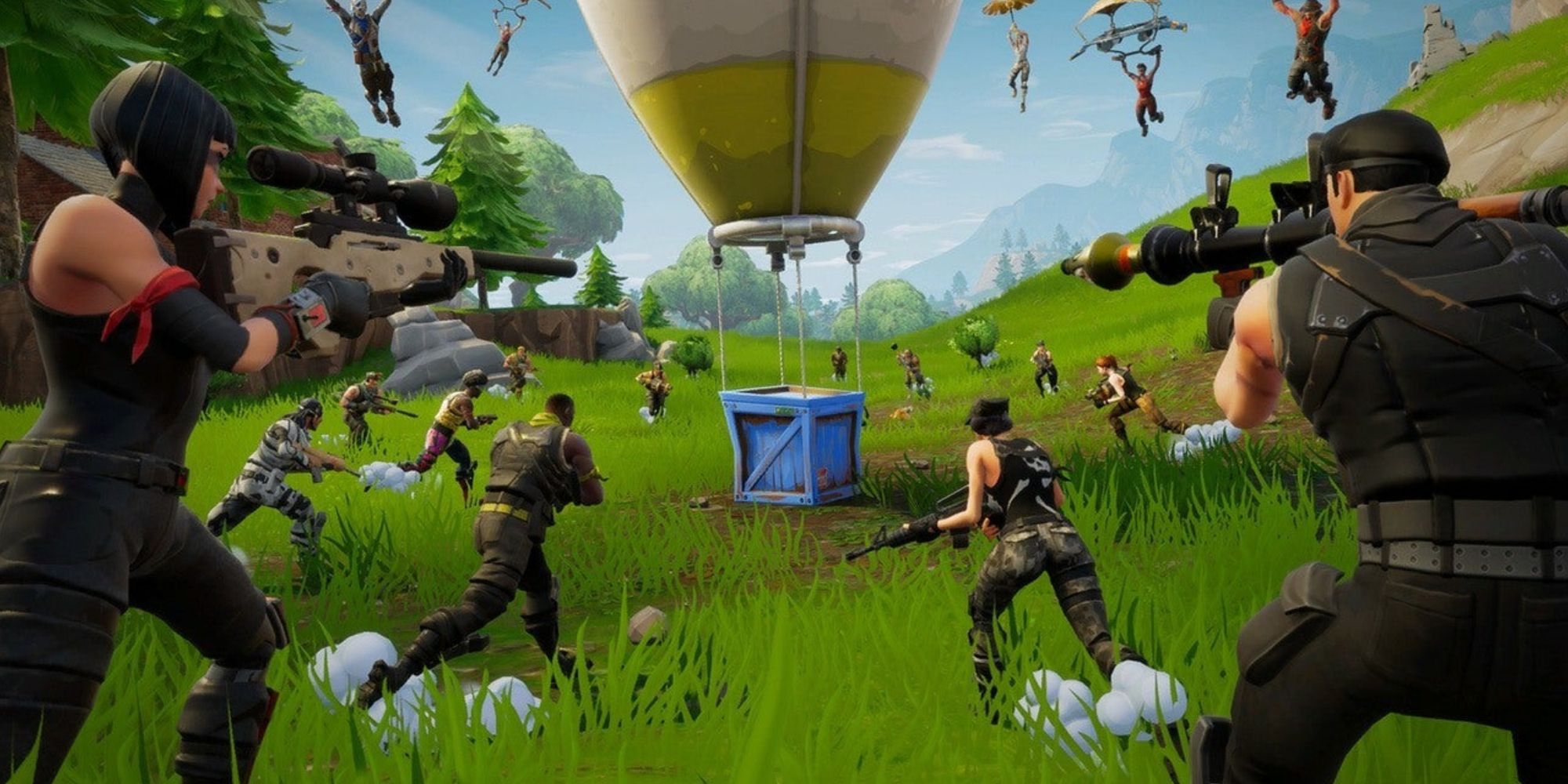 Fortnite screenshot of players running towards a supply drop.