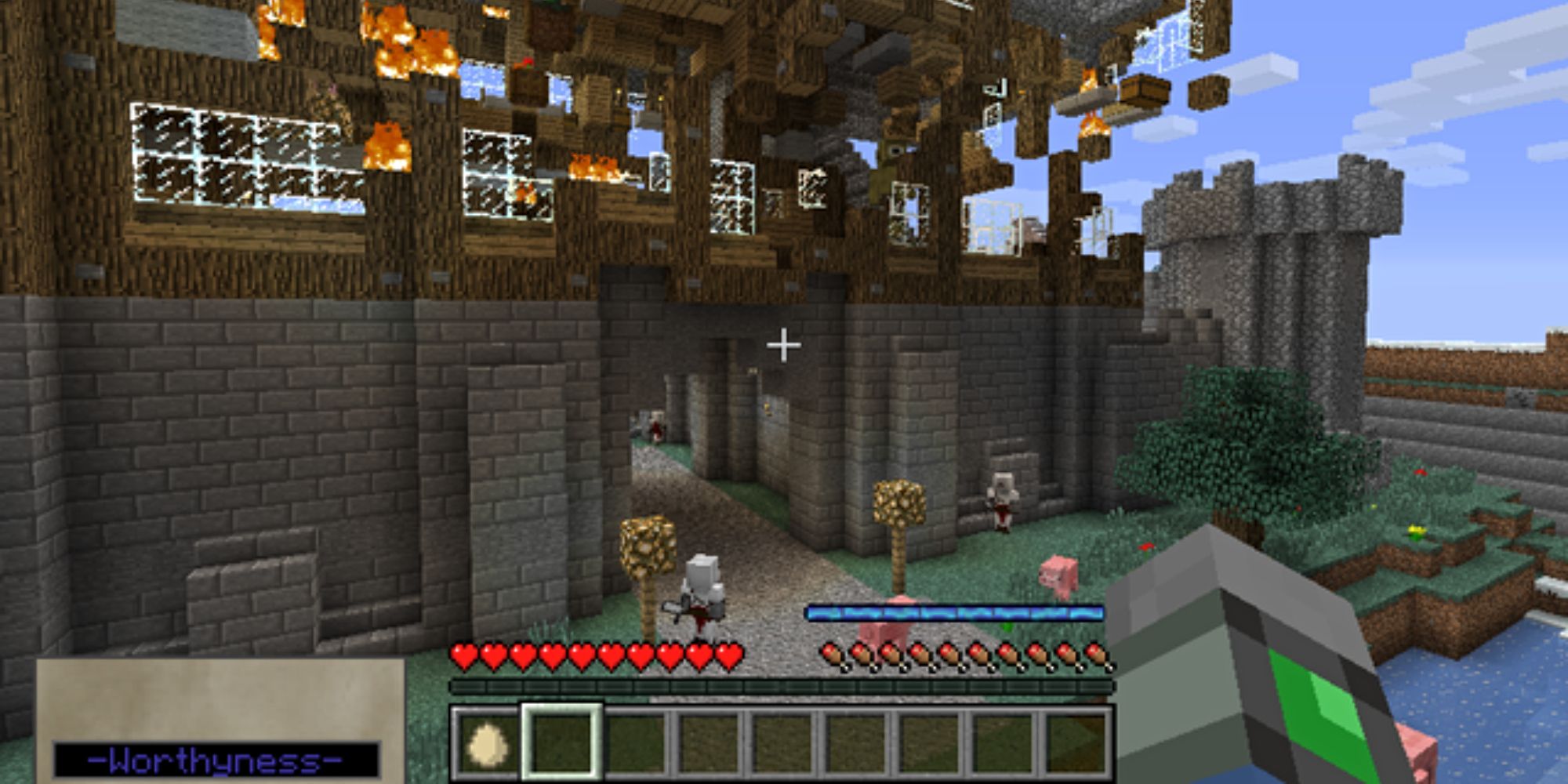 DivineRPG minecraft mod of burning town.