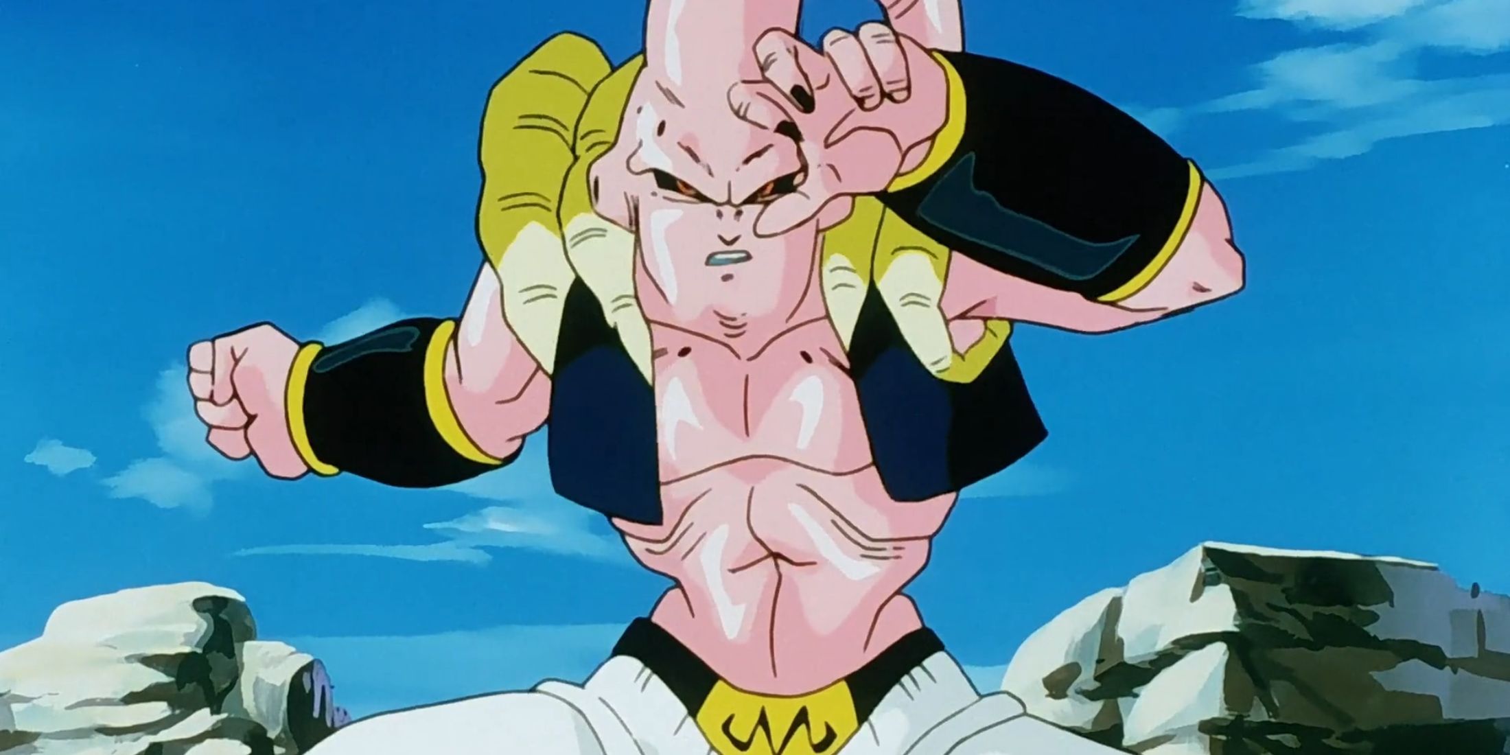 Super Buu prepares to fight Ultimate Gohan, having absorbed Gotenks and Piccolo during the Buu saga in Dragon Ball Z (1989 - 1996)