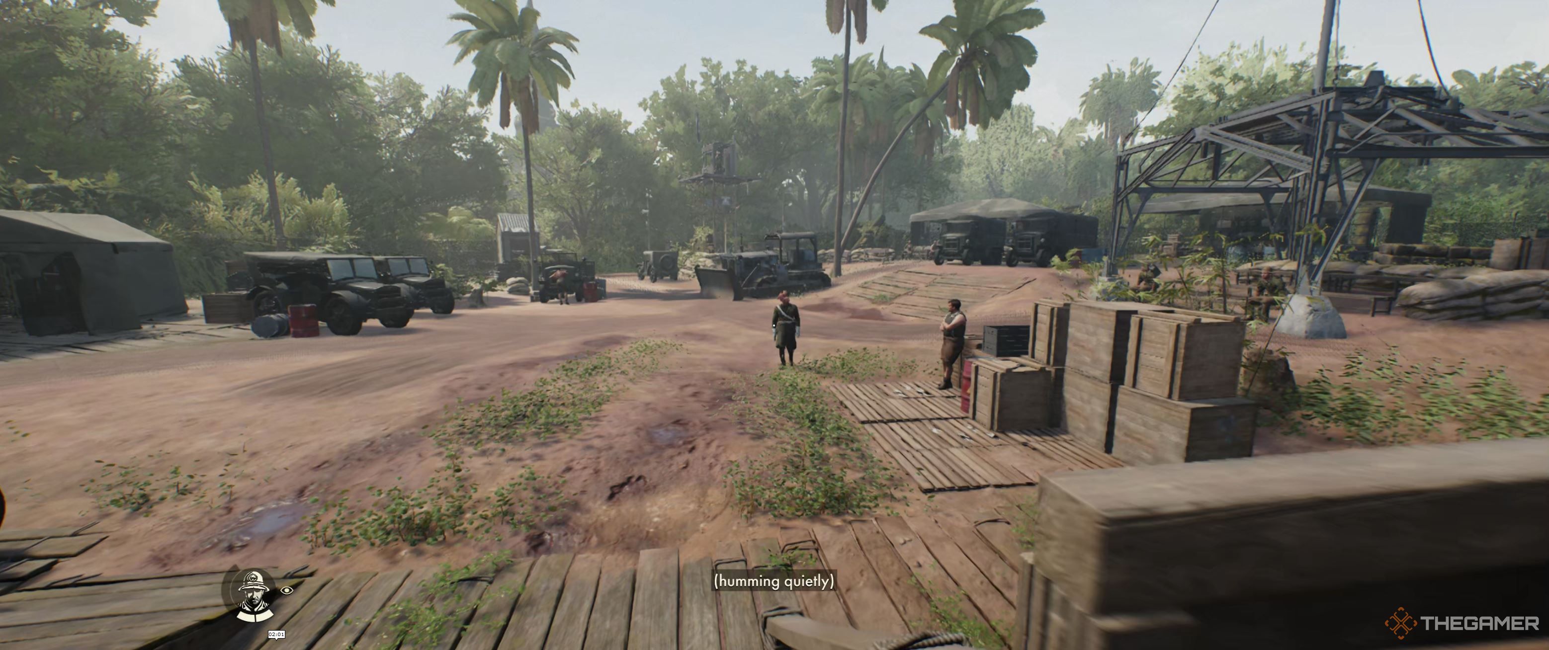 Looking at the military zone, in the open, with a few soldiers at the front and some vehicles around.