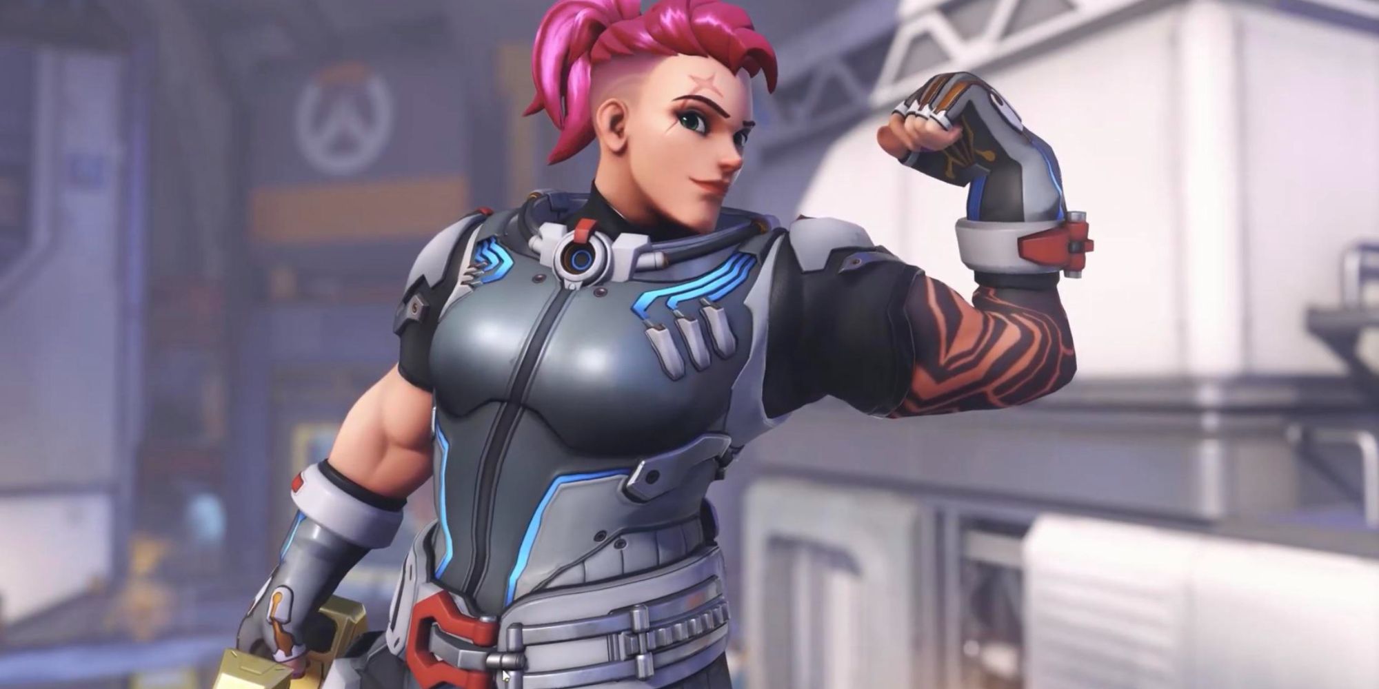 Zarya in Overwatch 2 flexing her bicep for the camera.