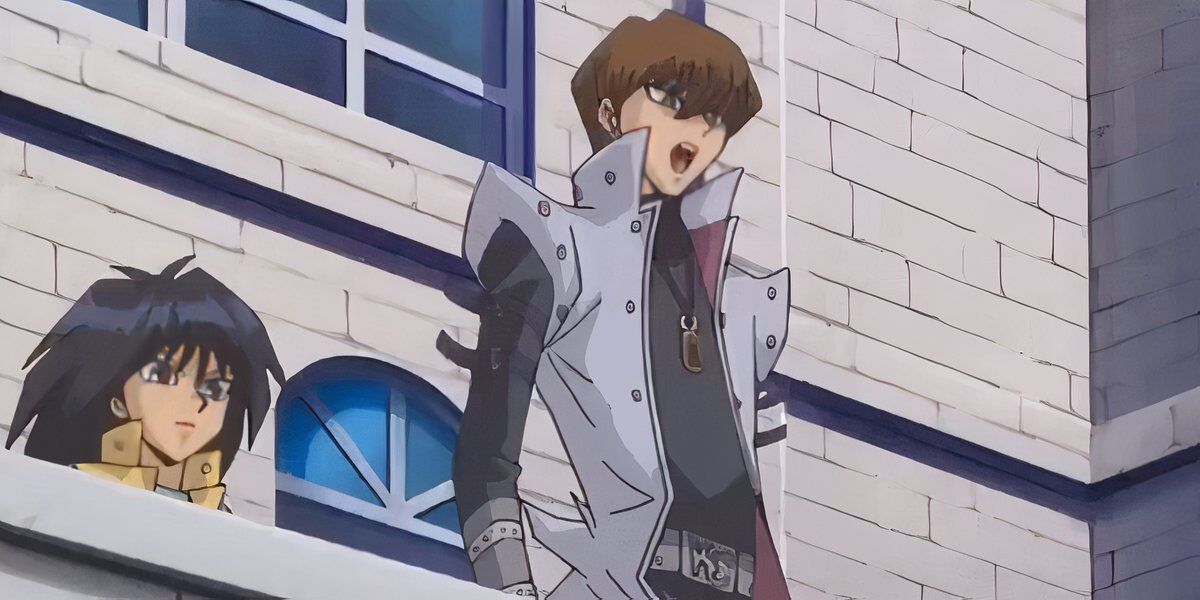 Kaiba and Mokubo standing on a balcony in Yu-Gi-Oh!