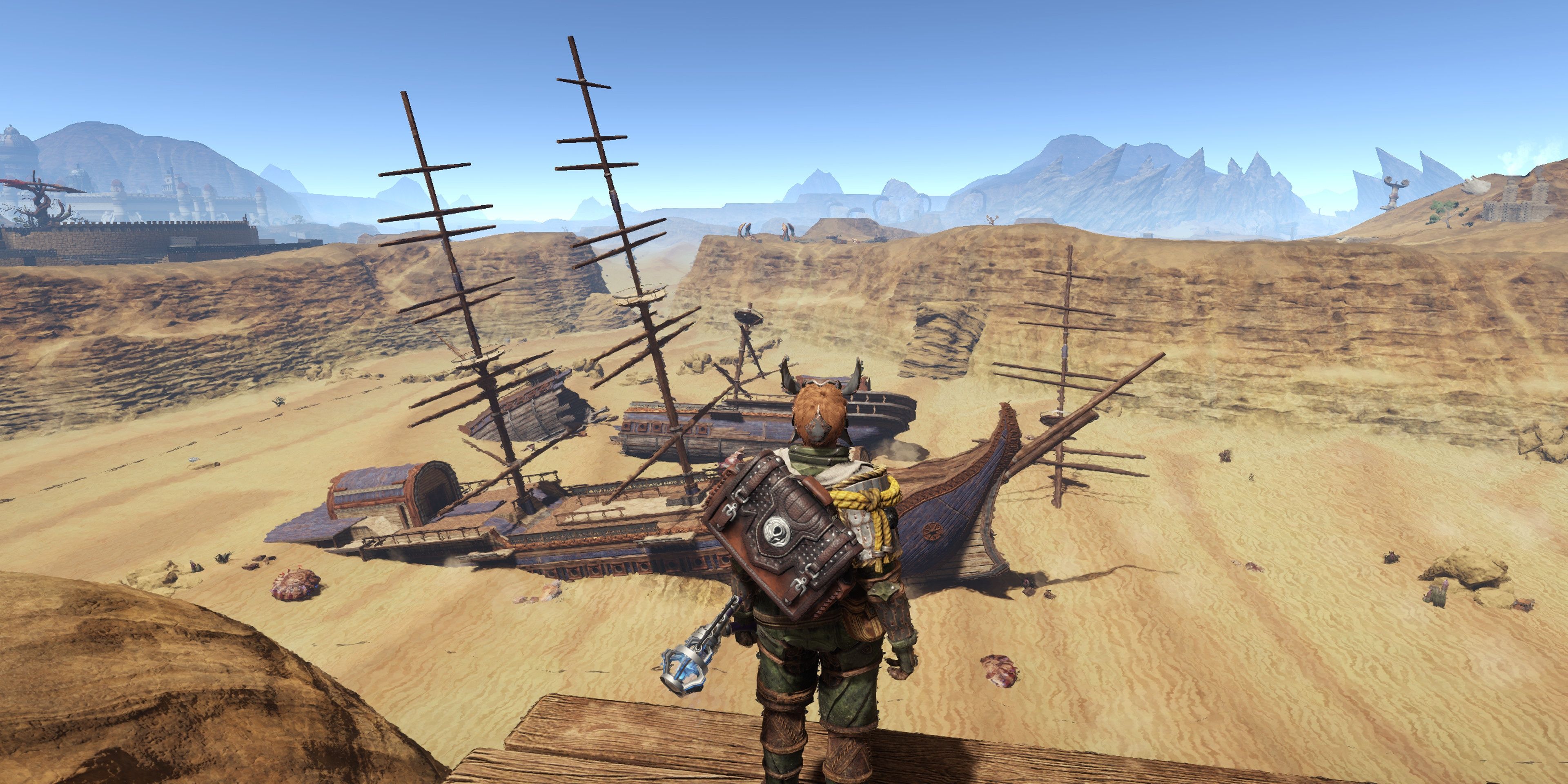 Outward: Large wooden ships in the middle of a desert.