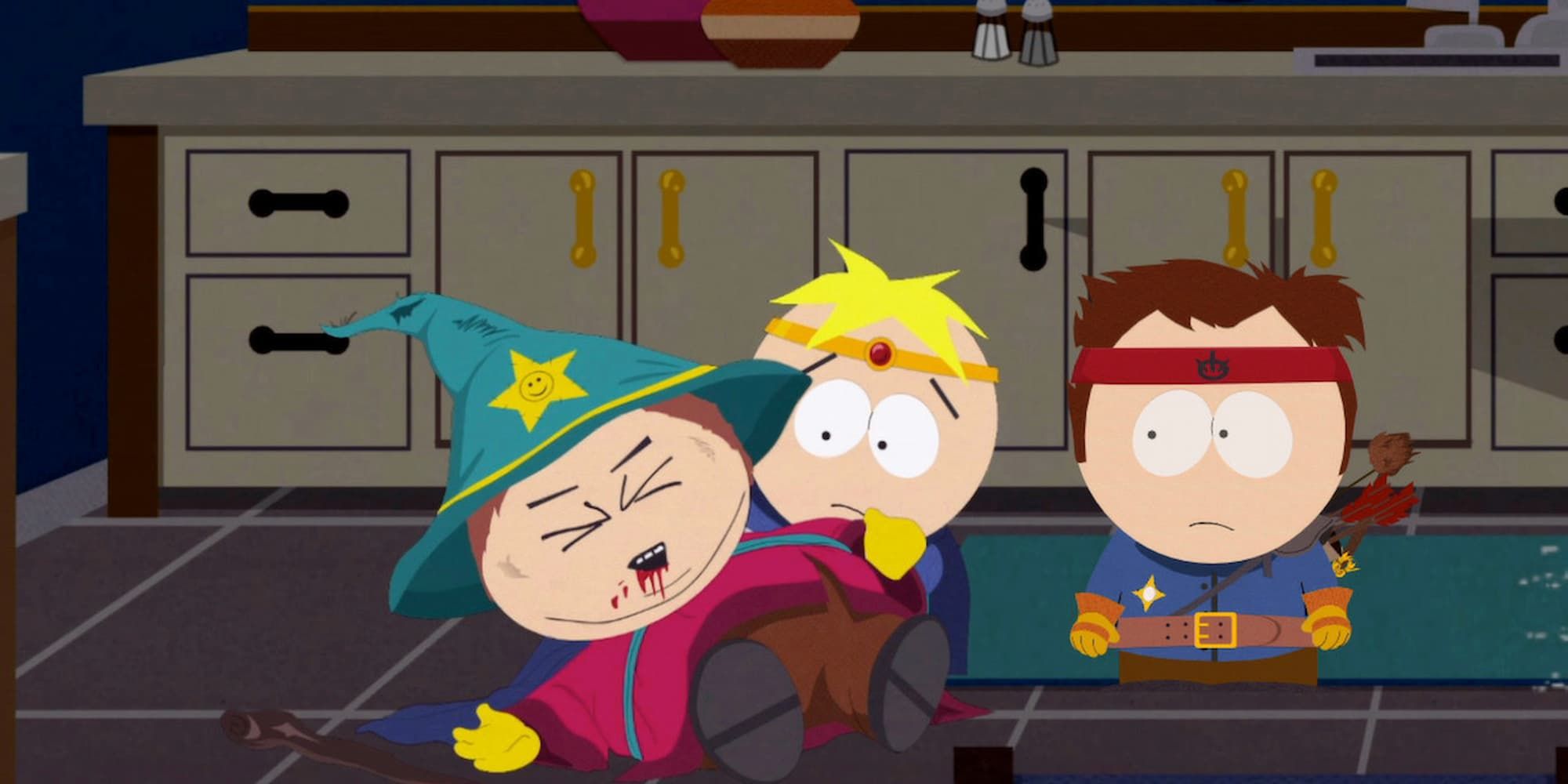 A custom character watches on in a kitchen as Butters tends to a wounded Cartman in South Park: The Stick Of Truth.