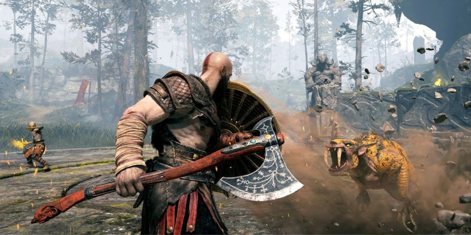 Kratos attacking enemies with axe and shield in God of War.