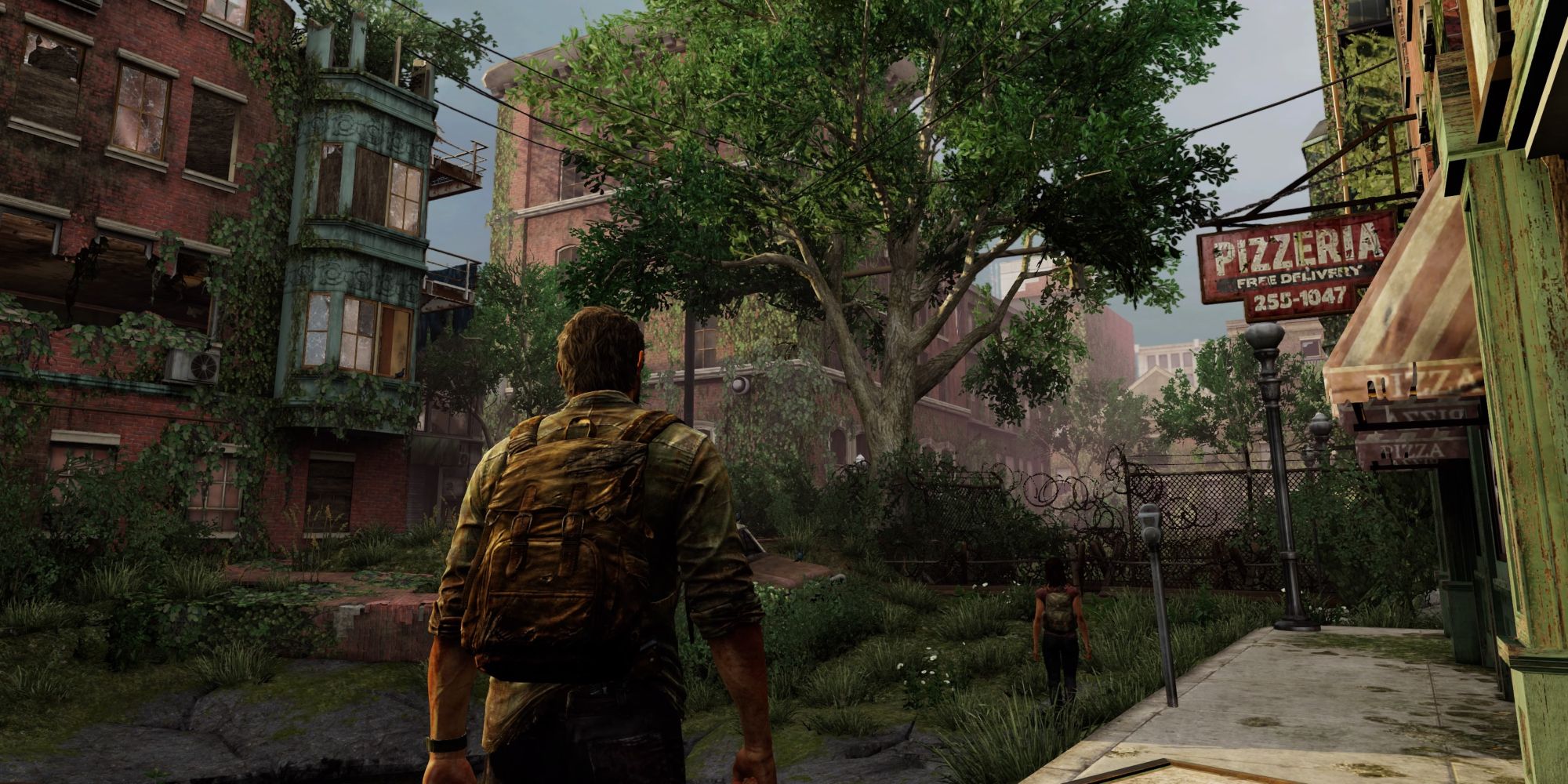 Joel and Ellie walking through an abandoned city.