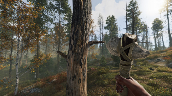 A player holds an axe up to a tree trunk is Rust, one of the best games like Minecraft.