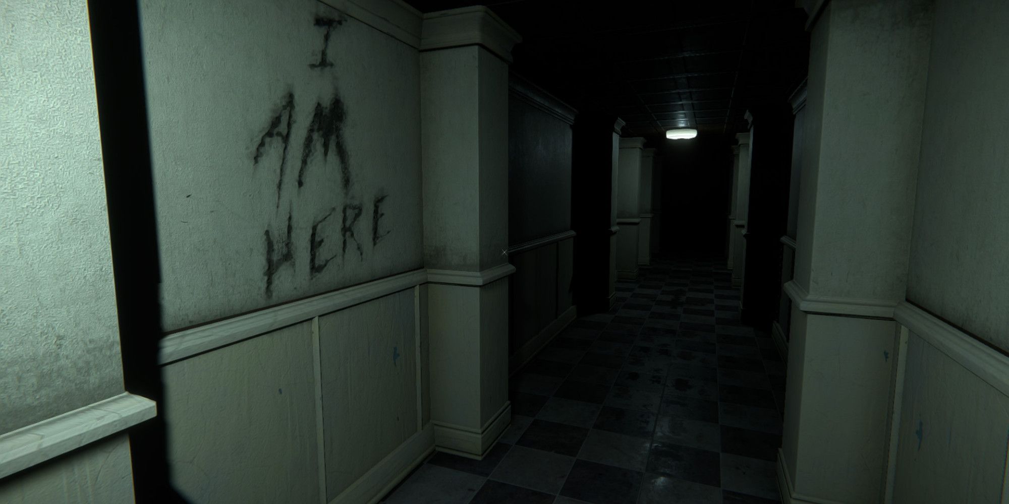 The Mortuary Assistant - Hallway with an eerie message scrawled in blood.