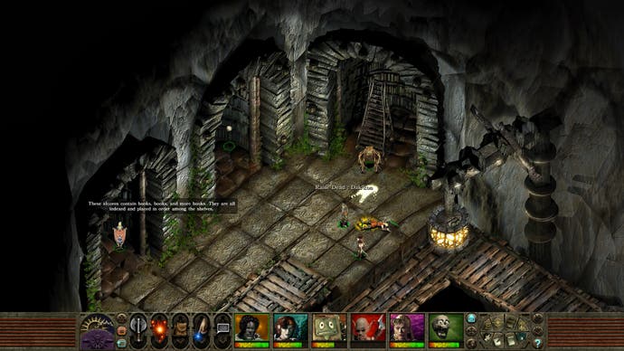 An isometric view of alcoves in a grimy dungeon, which is said to contain plenty of books, in Planescape Torment: Enhanced Edition.