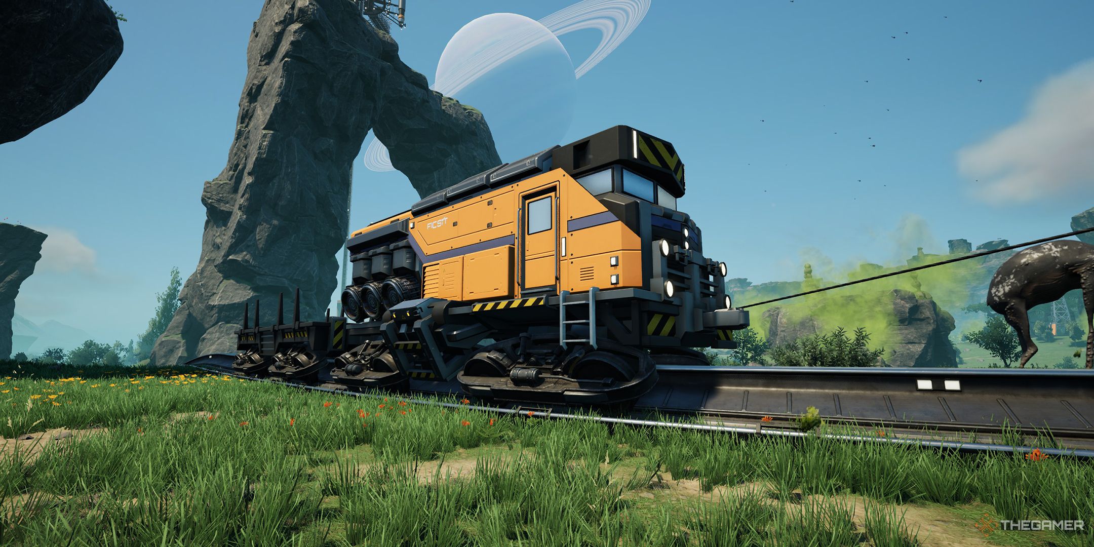 A train driving along a railway with a distant planet in the sky in the background.