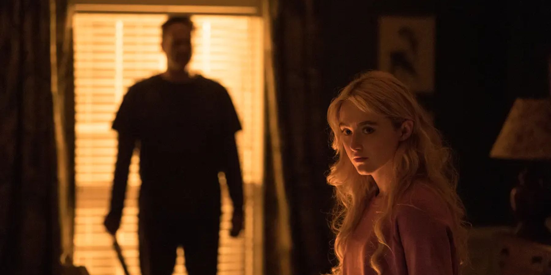 Vince Vaughn standing behind Kathryn Newton in Freaky