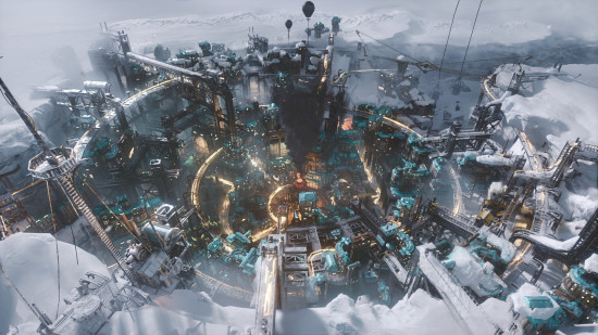 Image shows an industrial settlement in a snowy landscape in Frostpunk 2, one of the best city-building games.