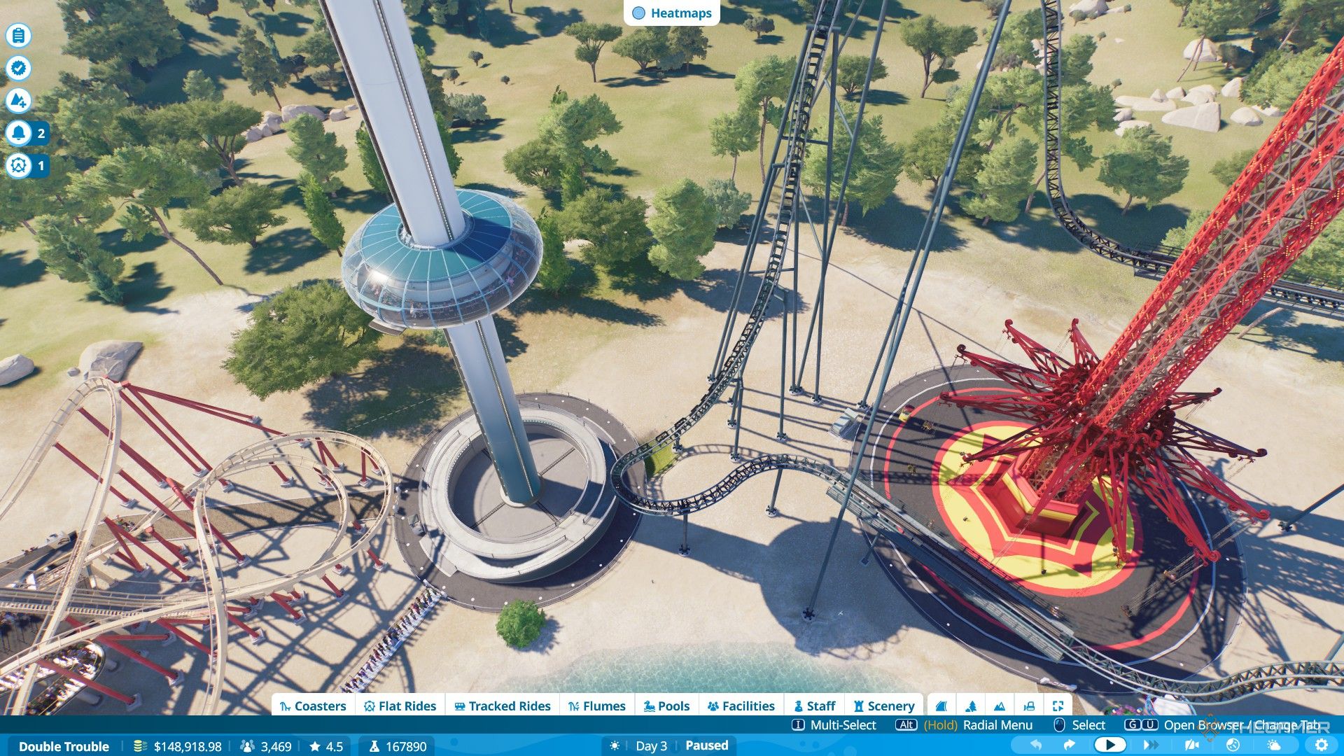 A sky watcher flat ride is standing next to Sun Flare in Planet Coaster 2.