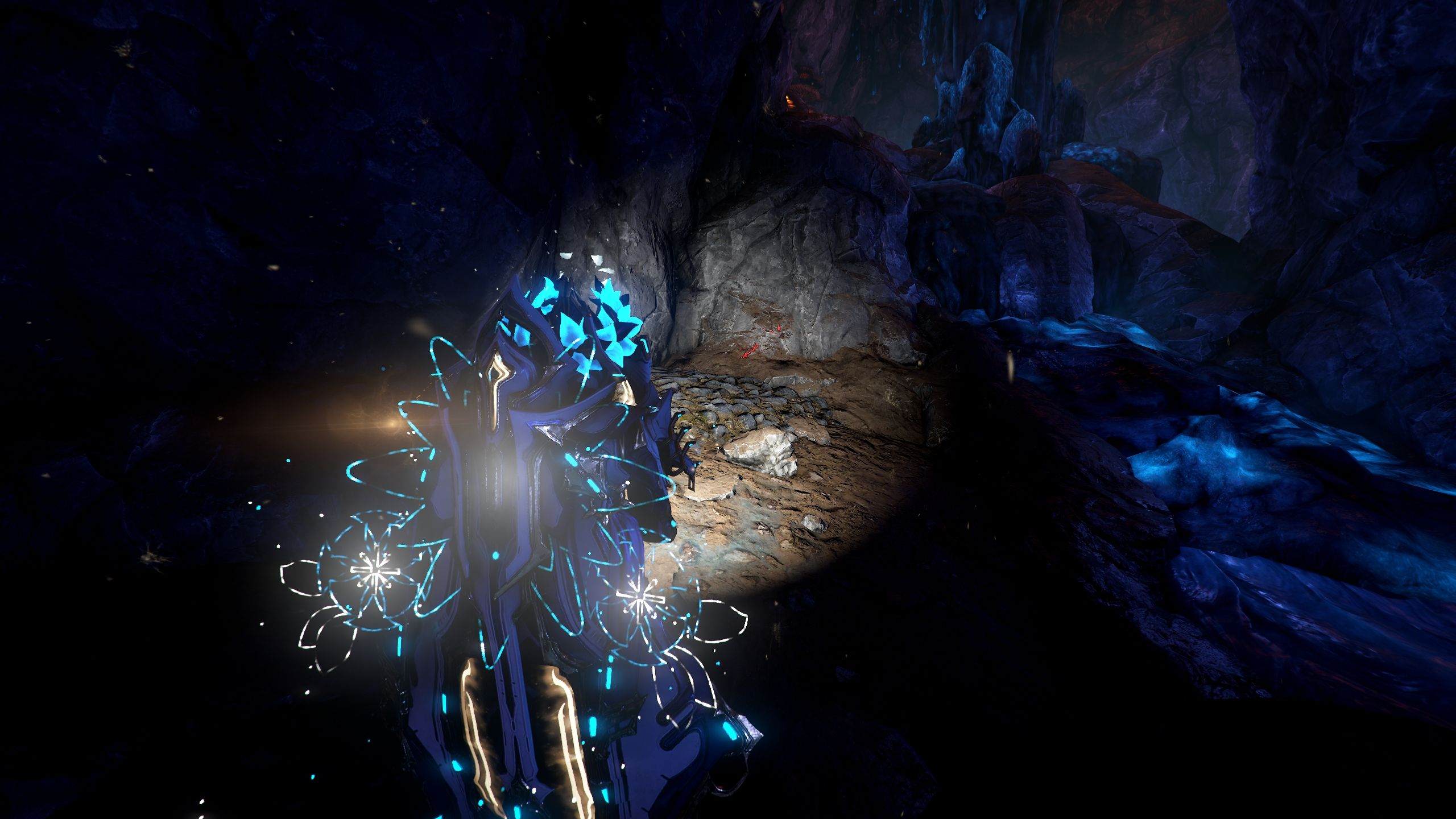 Loki looking at a red mineral vein in Warframe.