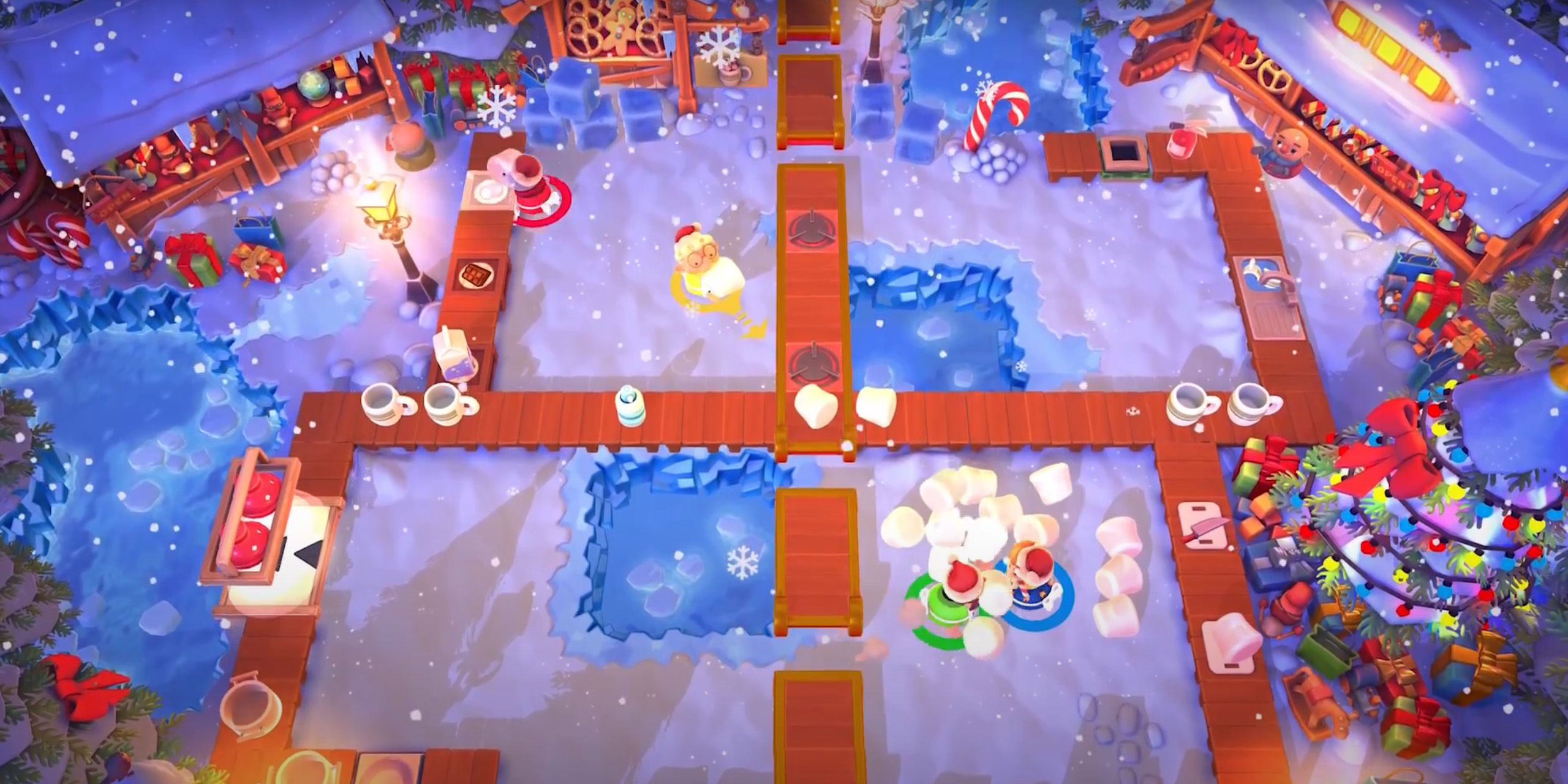 Four chefs toss marshmallows to each other in a snowy kitchen from Overcooked 2.