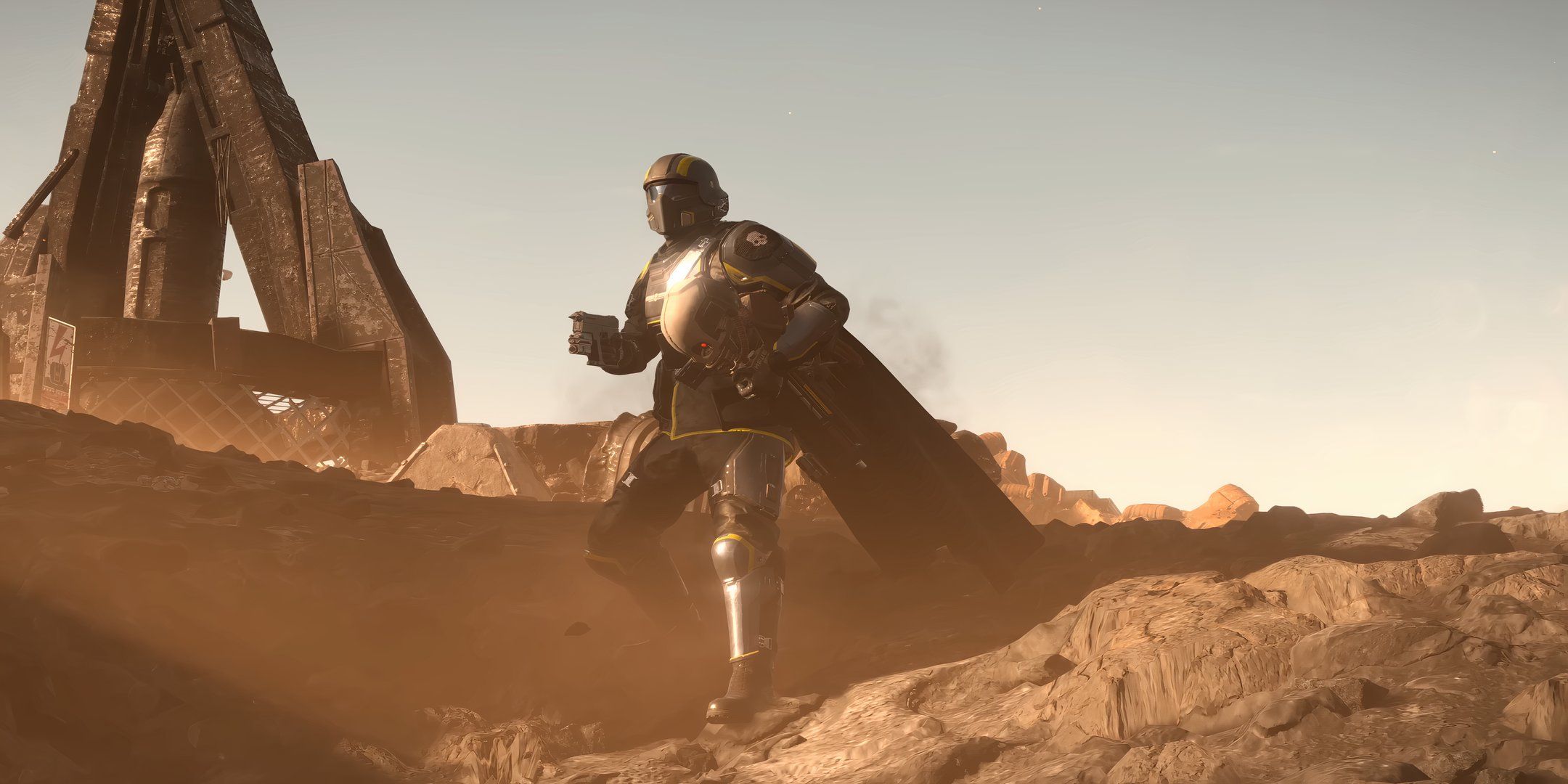 helldivers 2 character standing on a rocky planet