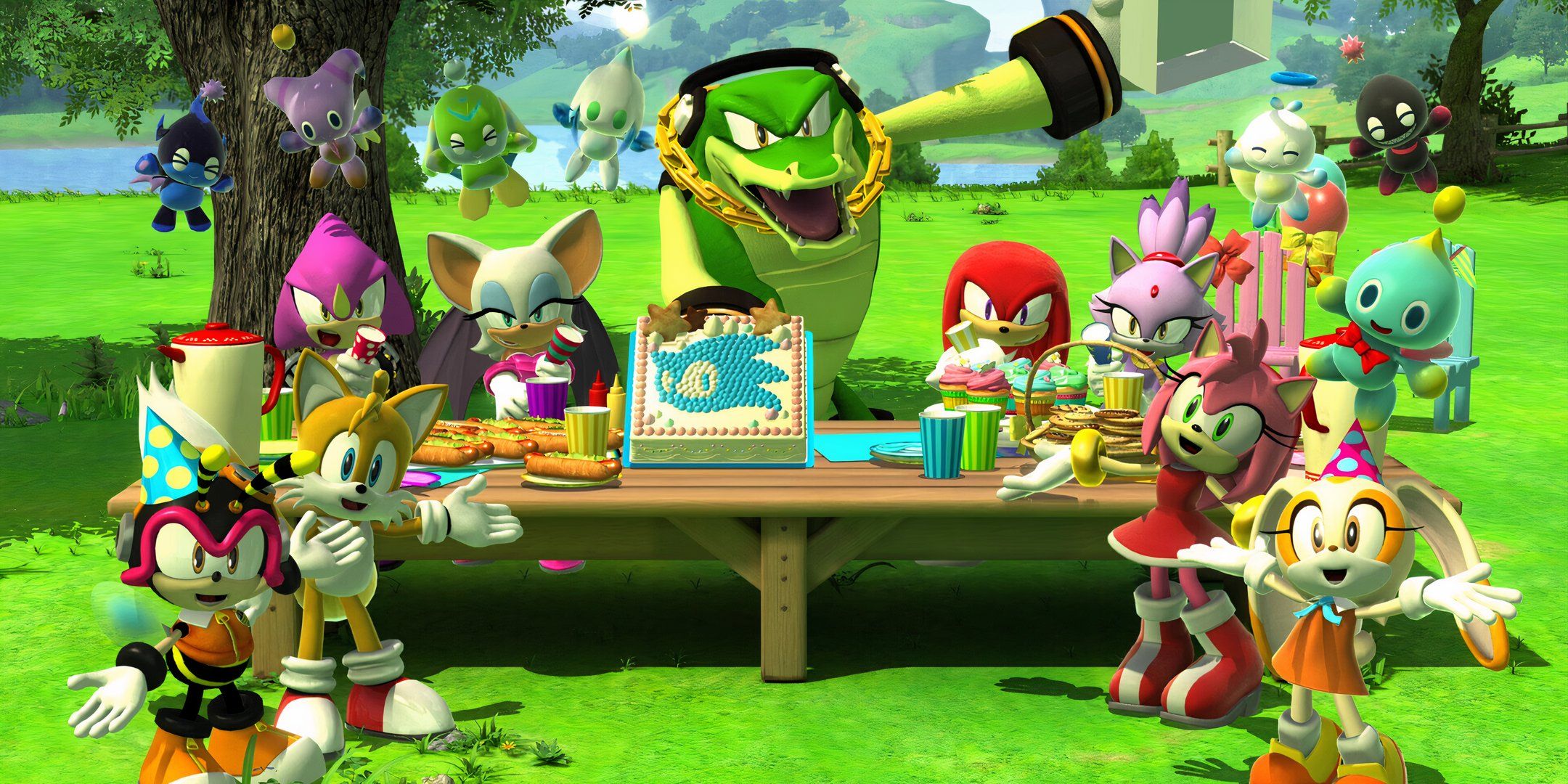 Many of Sonic's friends hold a cake and table of food.