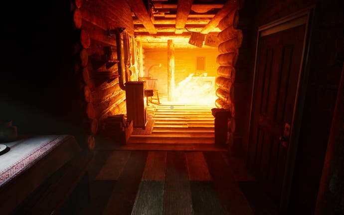 A man is seen trying to escape a fire inside a cabin in the game, The Cabin Factory.