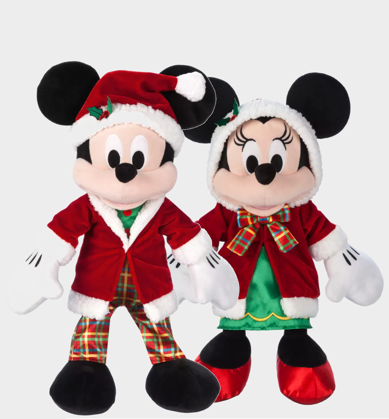 Disney Mickie and Minnie plush toys against a plain background