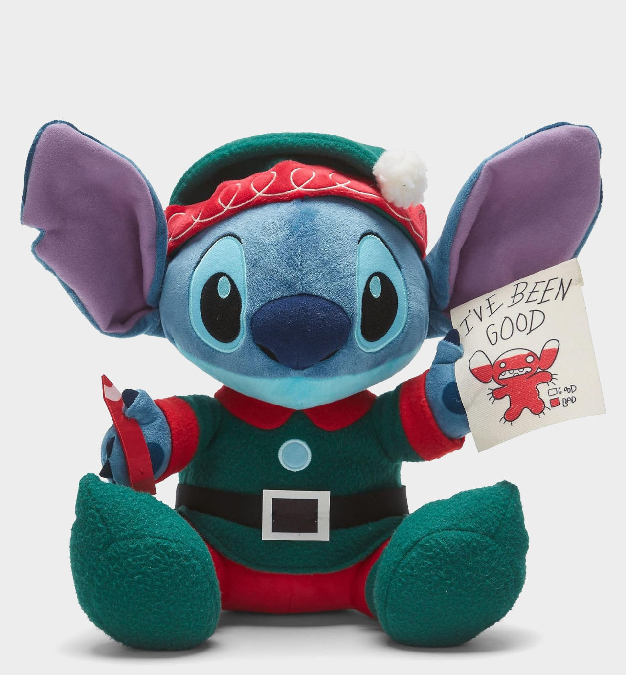 Disney Christmas Stitch plush toy on a plain background