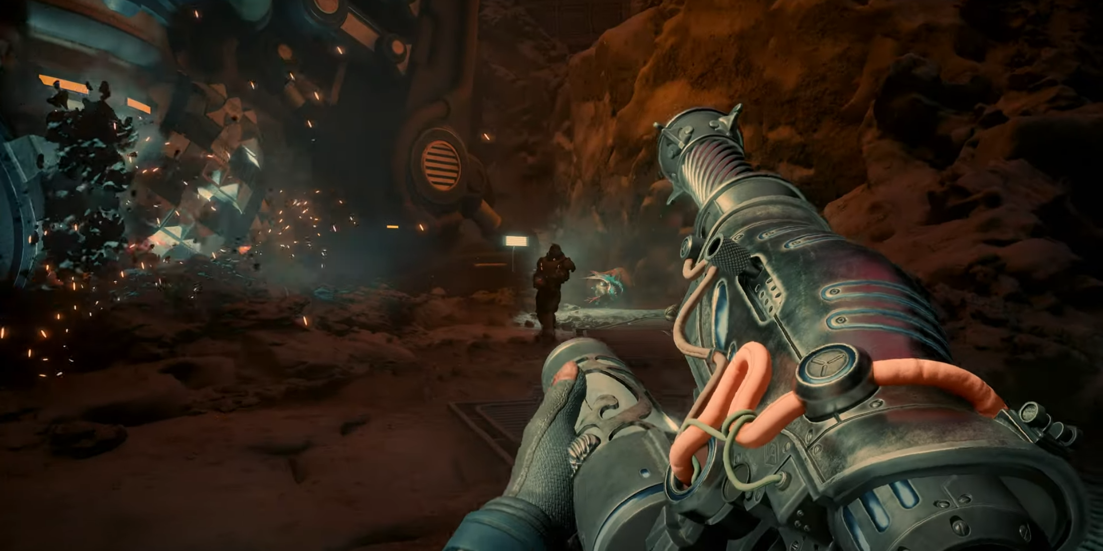 Player holding a circular weapon exploring a rocky cave in The Outer Worlds 2