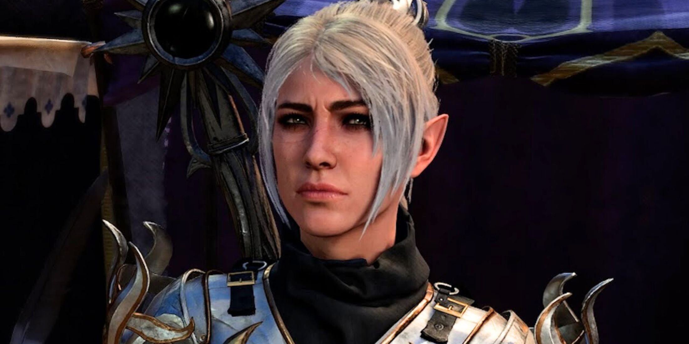 shadowheart with white hair and luminous armor in baldur's gate 3 