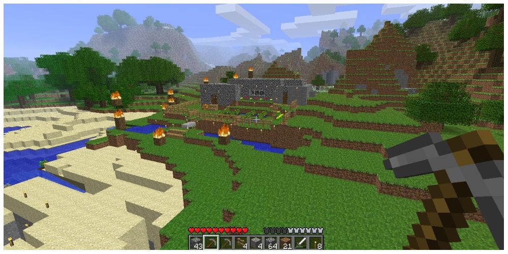 screenshot overlooking a basecamp in Minecraft