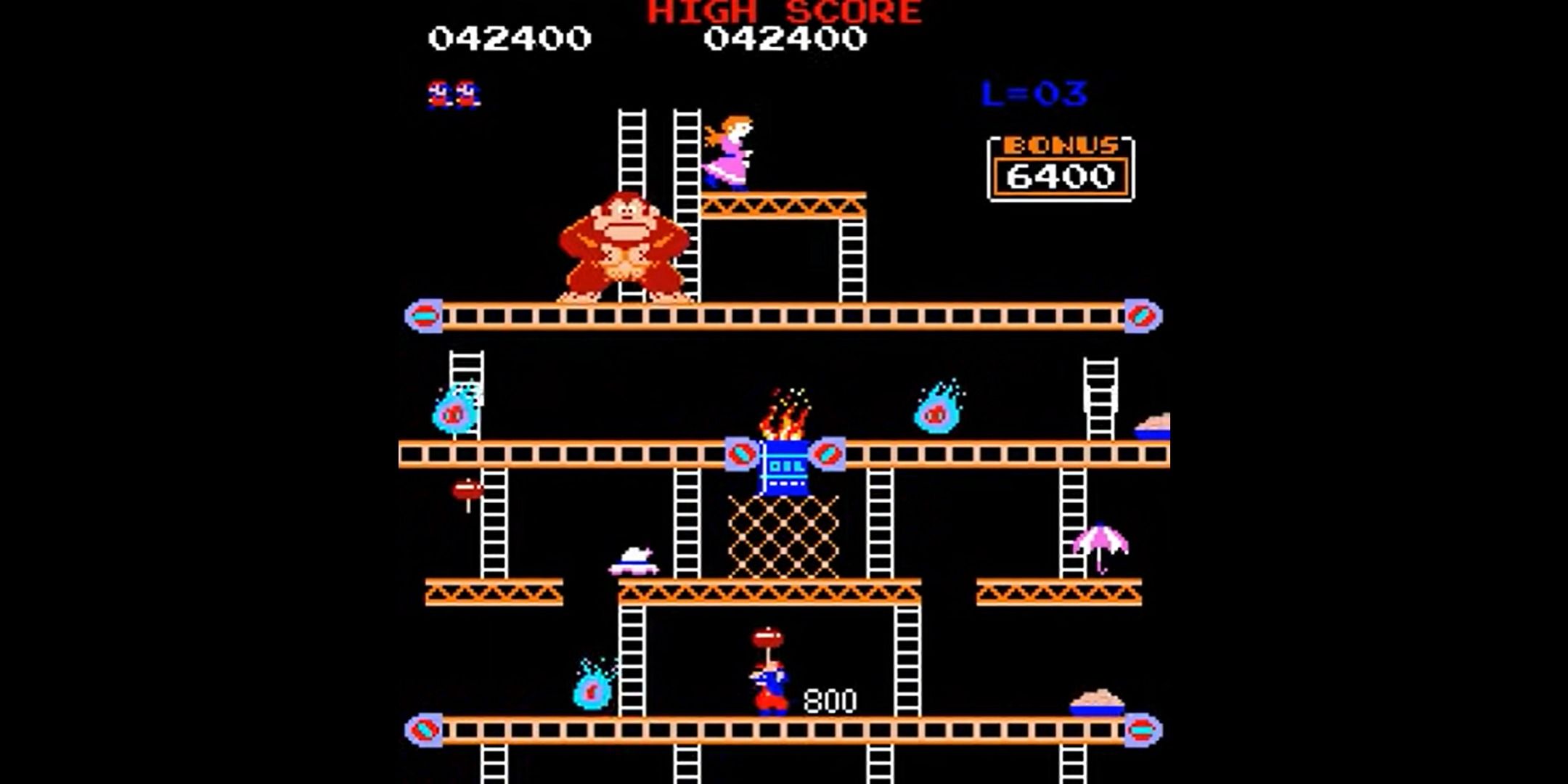 Mario swinging a hammer in Donkey Kong.