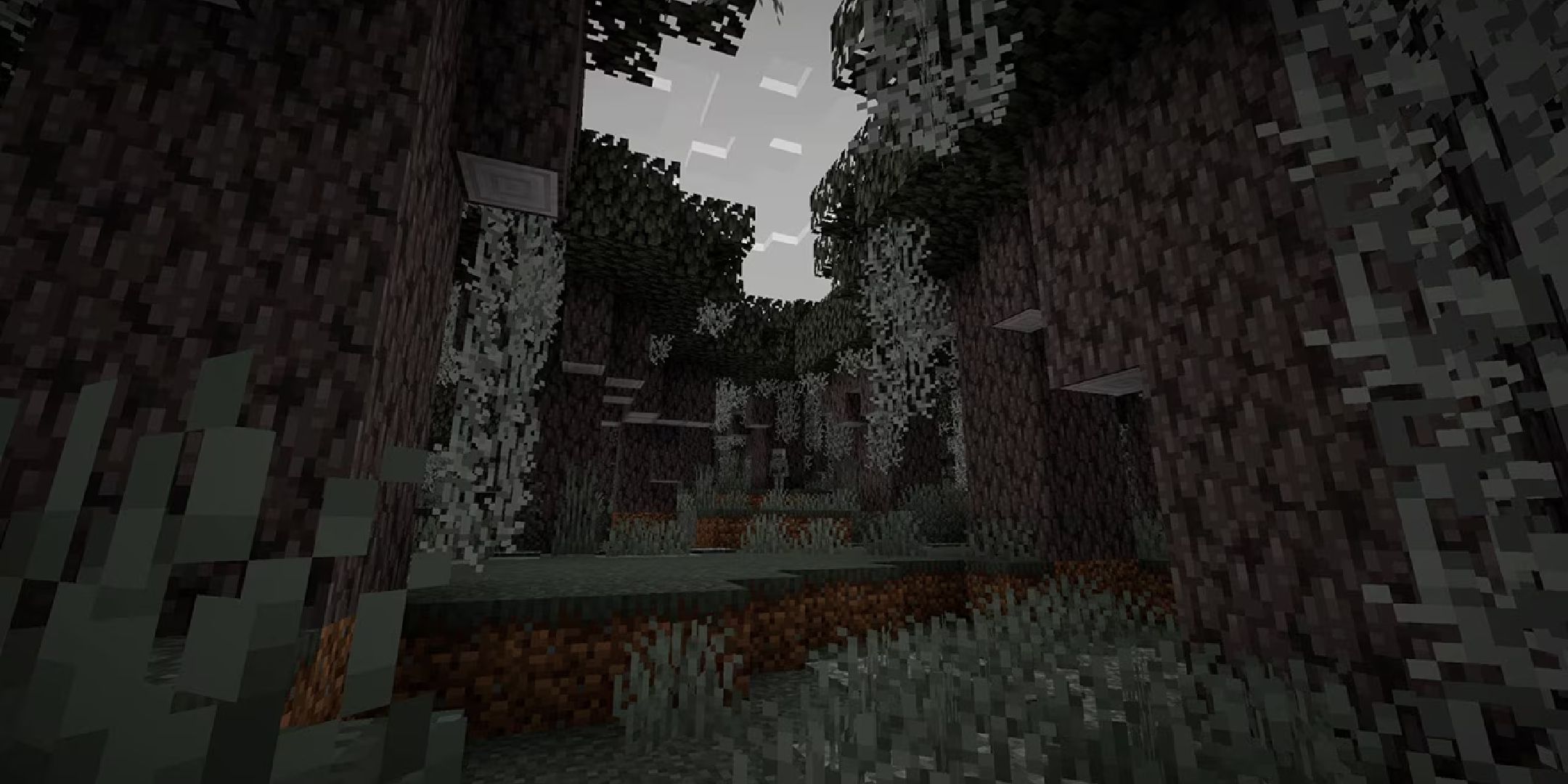 A player in the Pale Garden Minecraft biome.