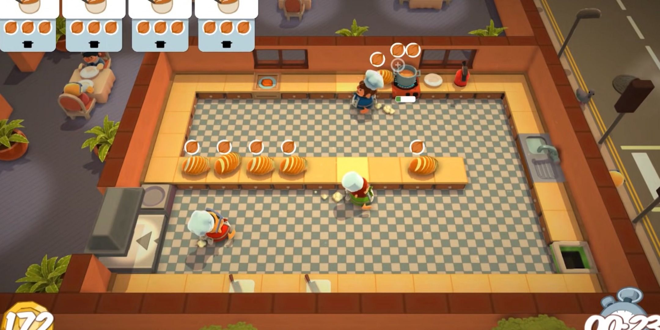 3 players running around an Overcooked kitchen level.