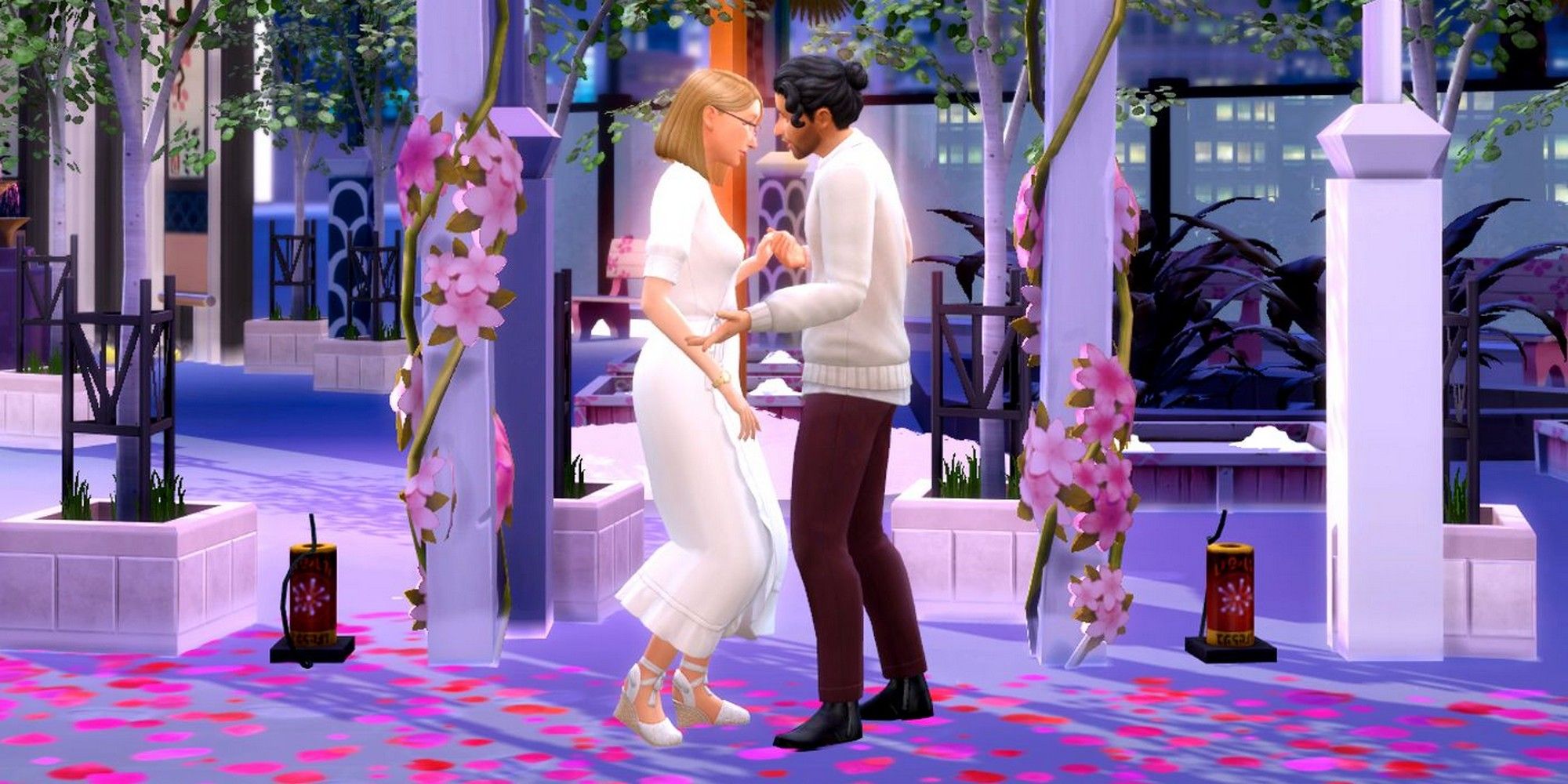 Two Sims getting married at the romance festival.