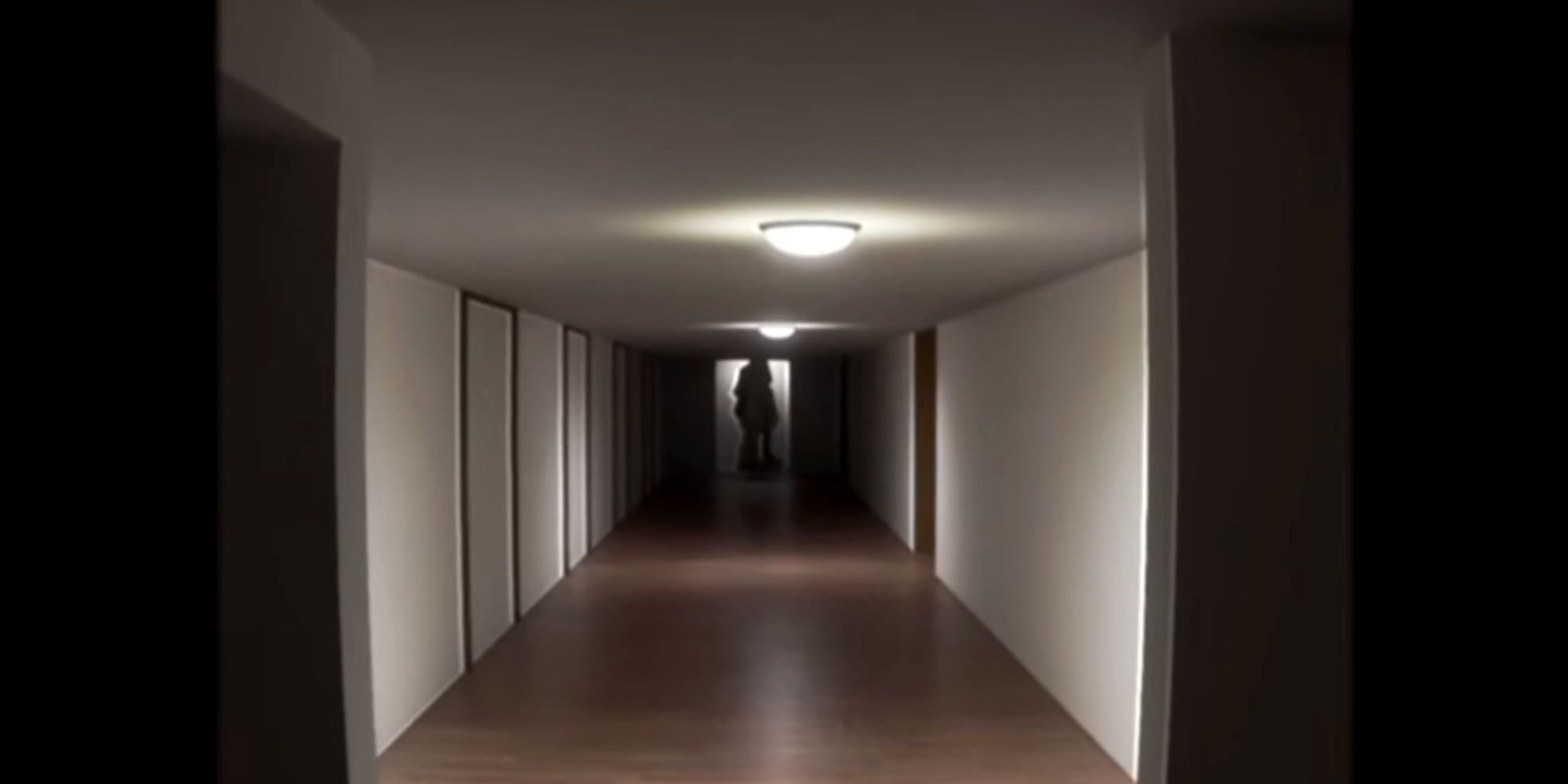 The Complex: Found Footage figure in corridor