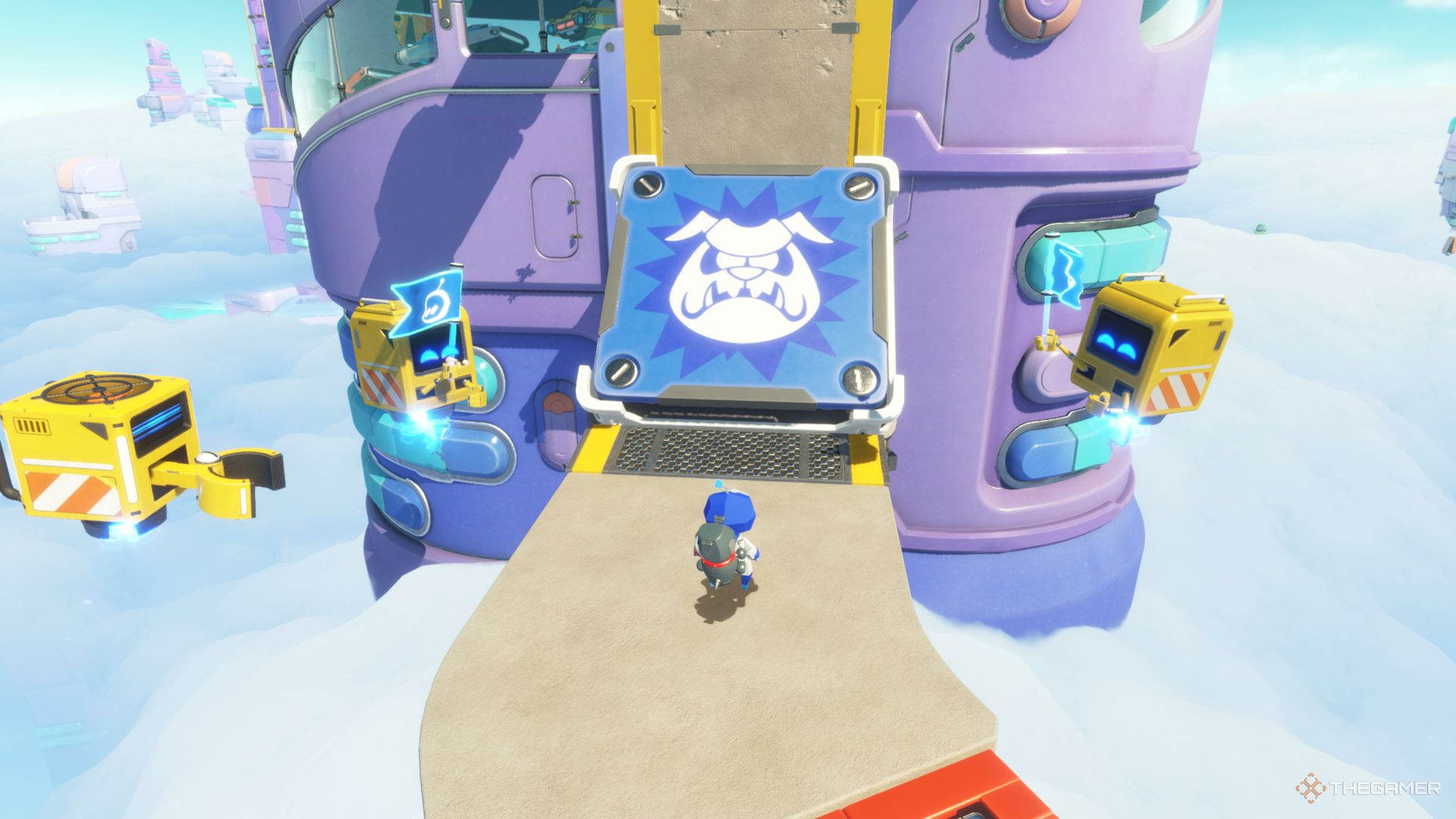 Astro Bot standing on a path just before a large square trampoline with the Bulldog Dash logo on it in the Building Speed level.