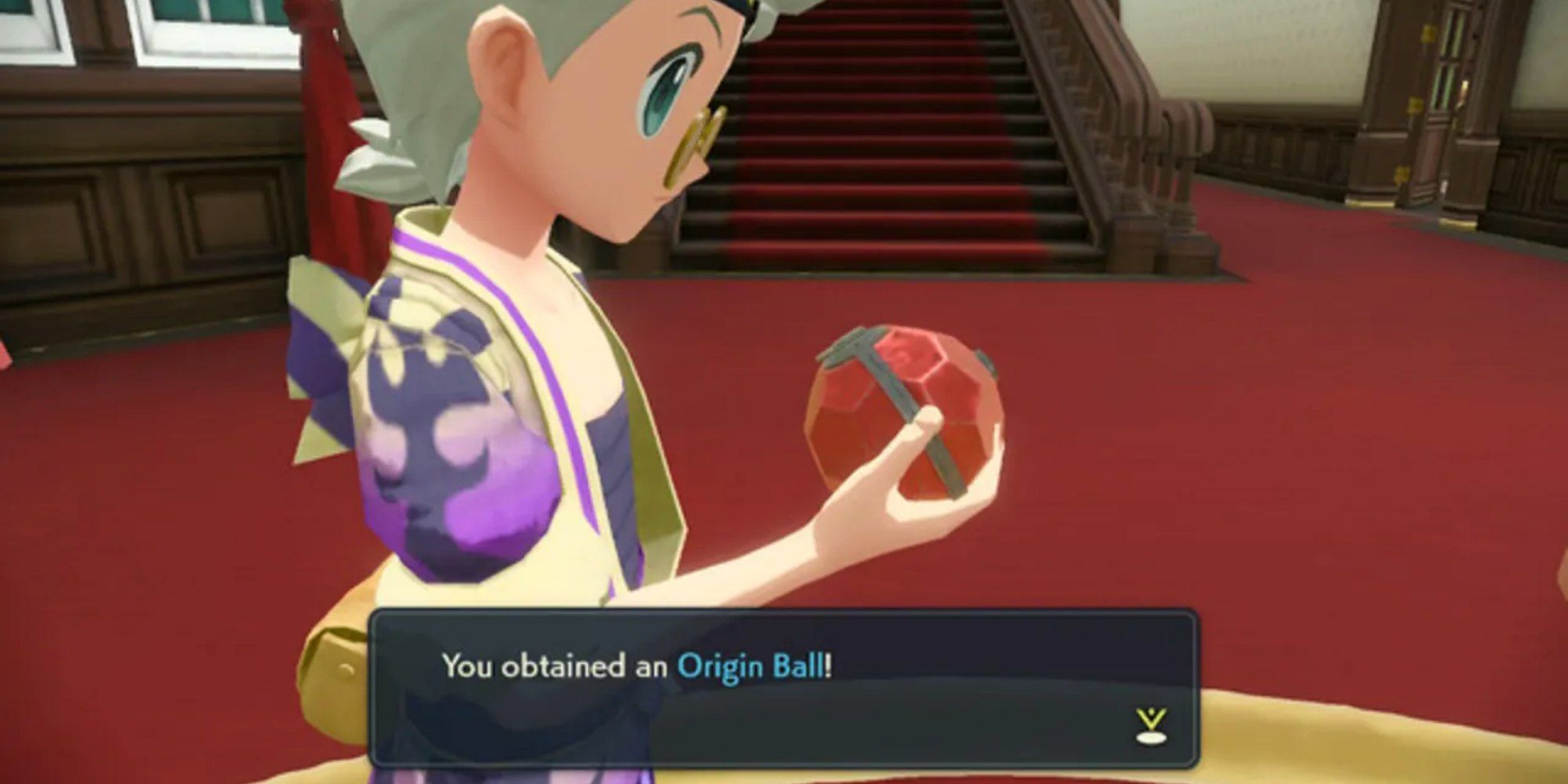 The Main Character holding the Origin Ball from Pokemon Legends: Arceus.