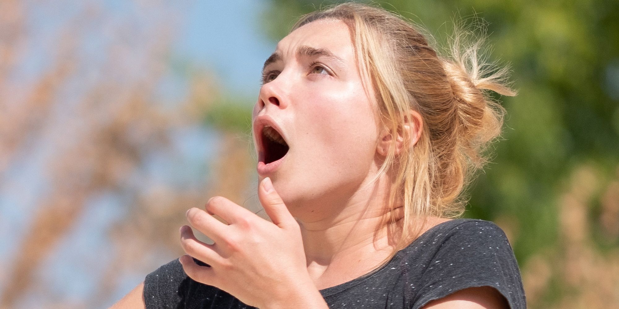 Florence Pugh staring shocked in Midsommar