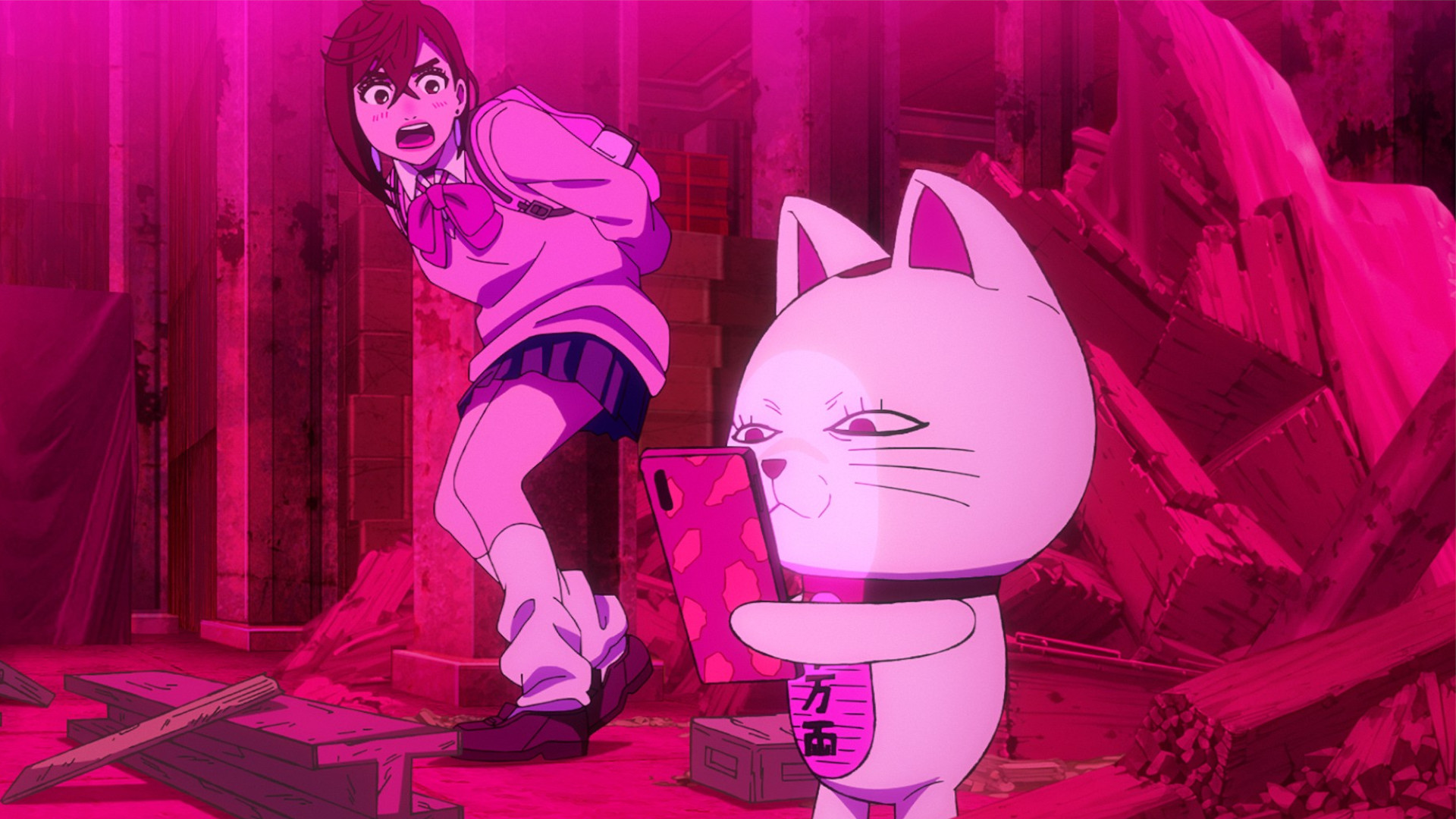 Momo and a cat on a phone during Dan Da Dan season 1 episode 6.