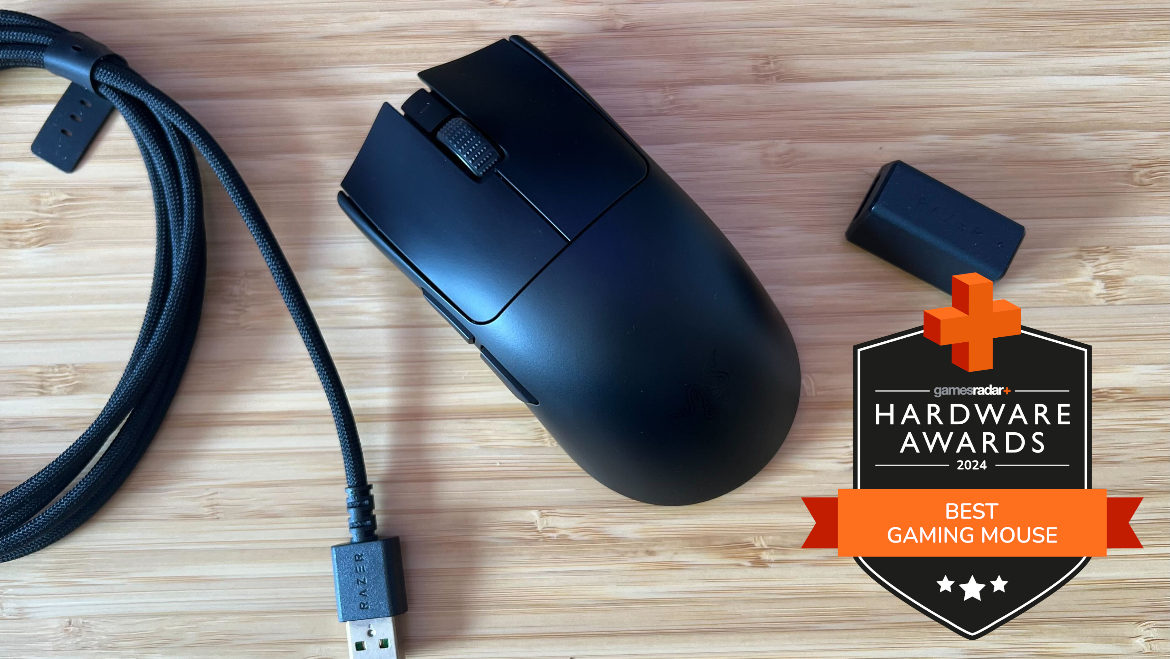 Razer Viper V3 Pro with cable and dongle on a wooden desk with GamesRadar+ Hardware Awards badge