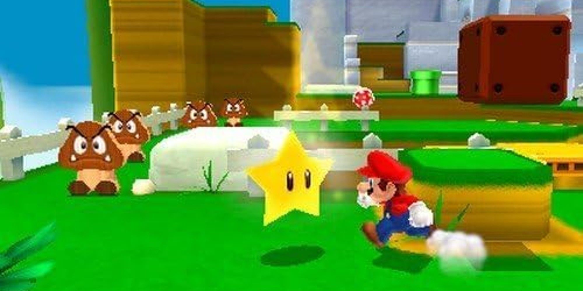 Mario running towards a star and some goombas.