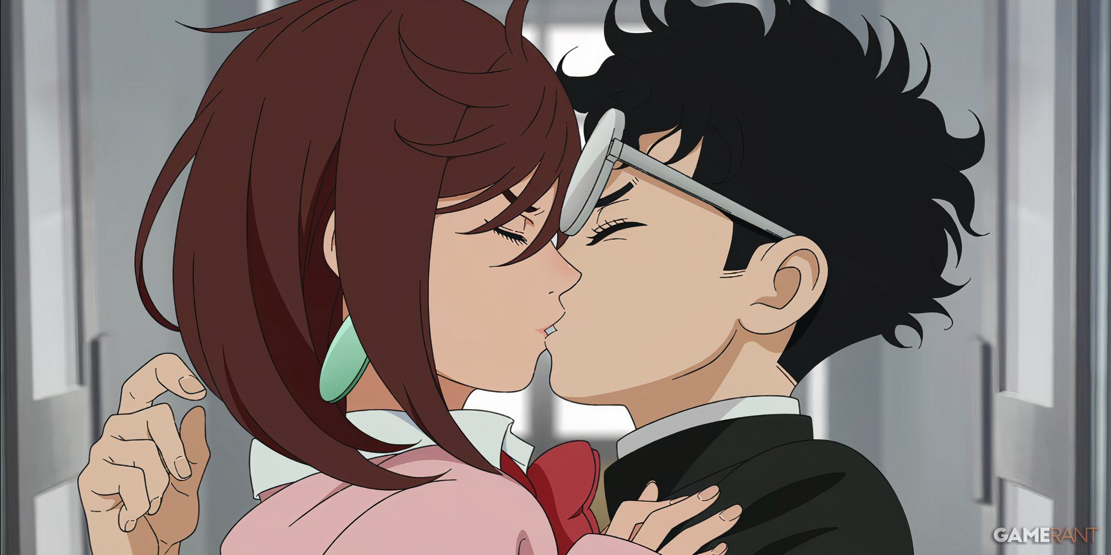 Momo and Okarun almost kiss while looking for each other at school in Dandadan.