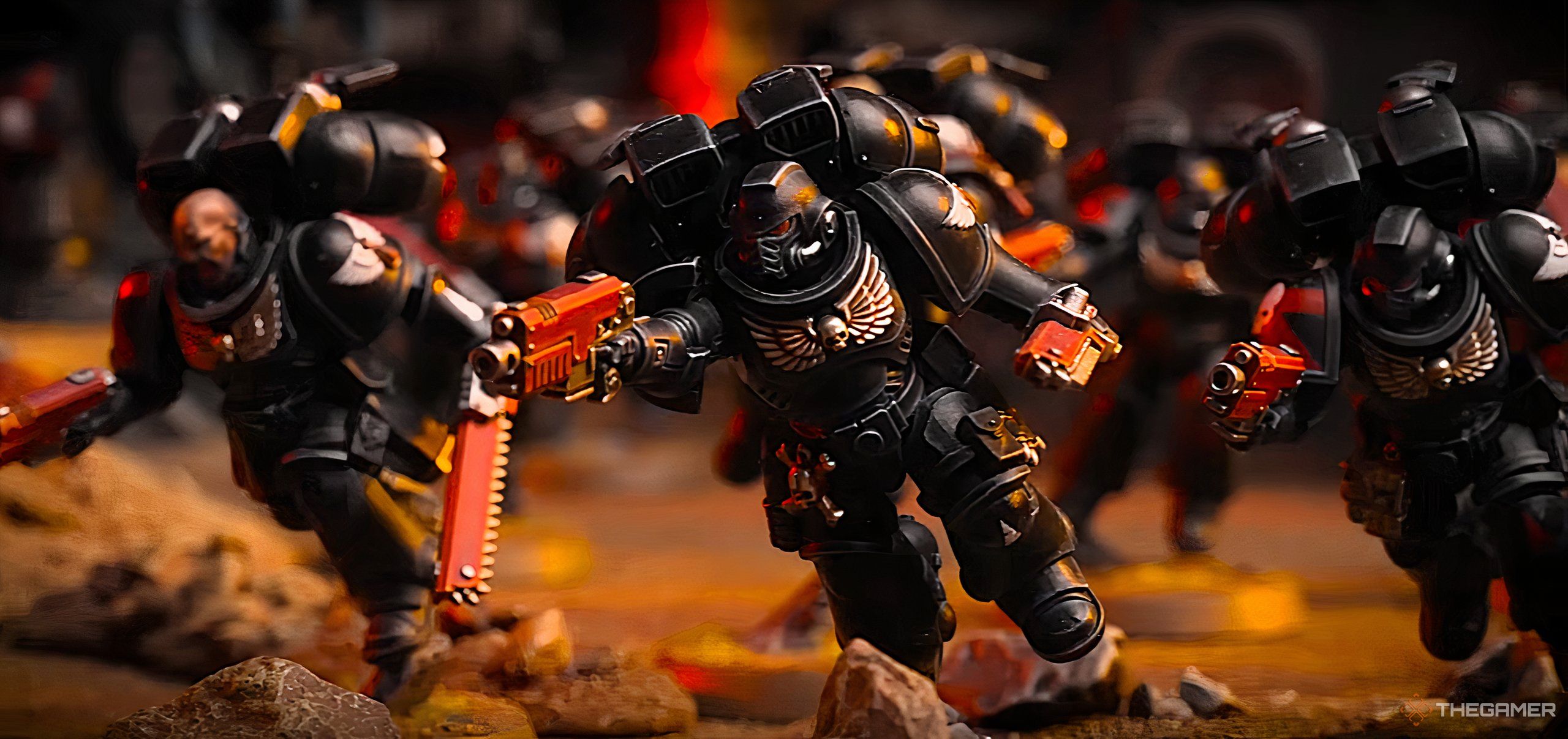 A unit of Blood Angels Death Company Marines with Jump Packs from Warhammer 40,000 tabletop.