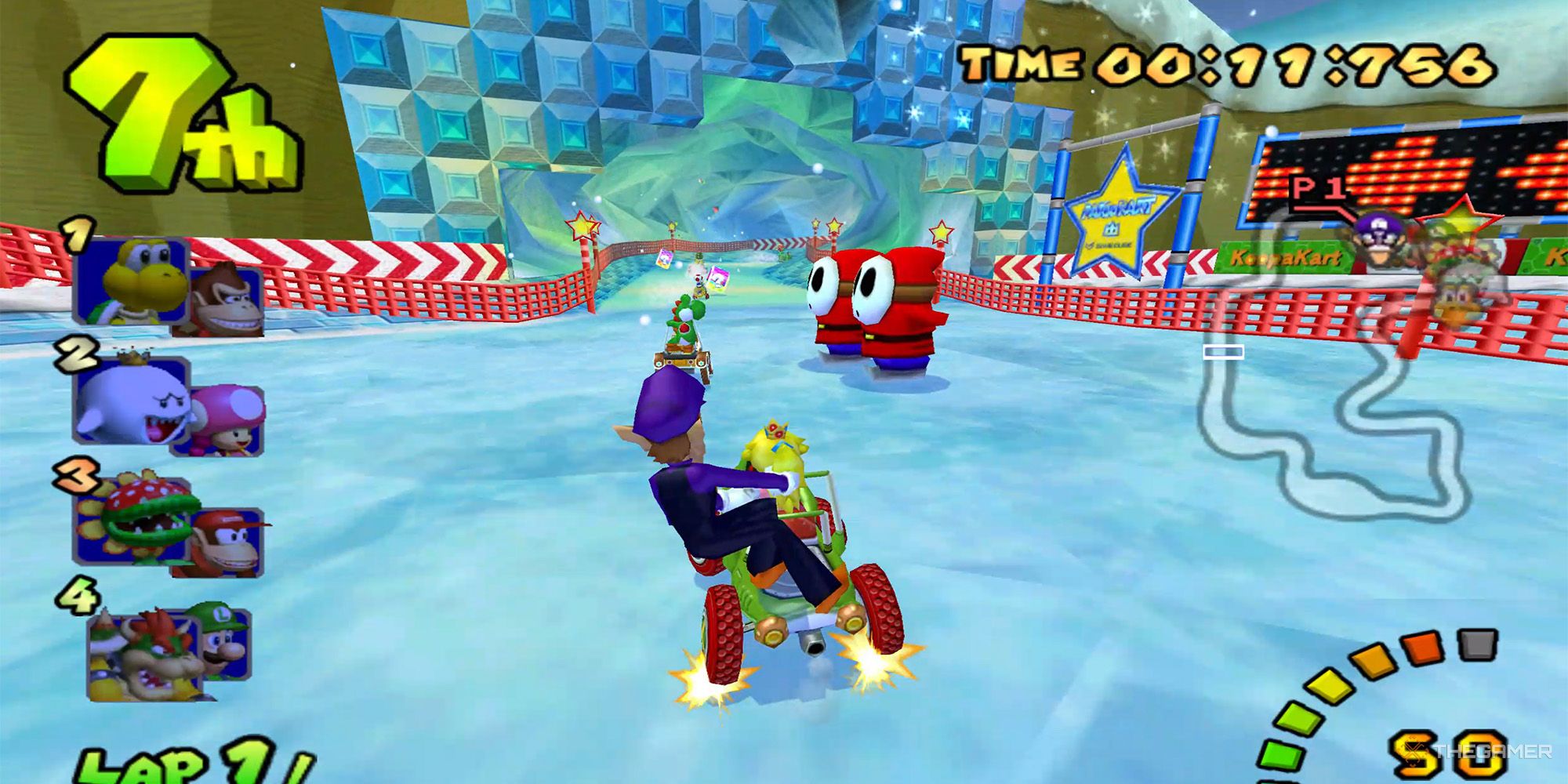 Waluigi and Peach racing in Sherbet Land from Mario Kart: Double Dash.