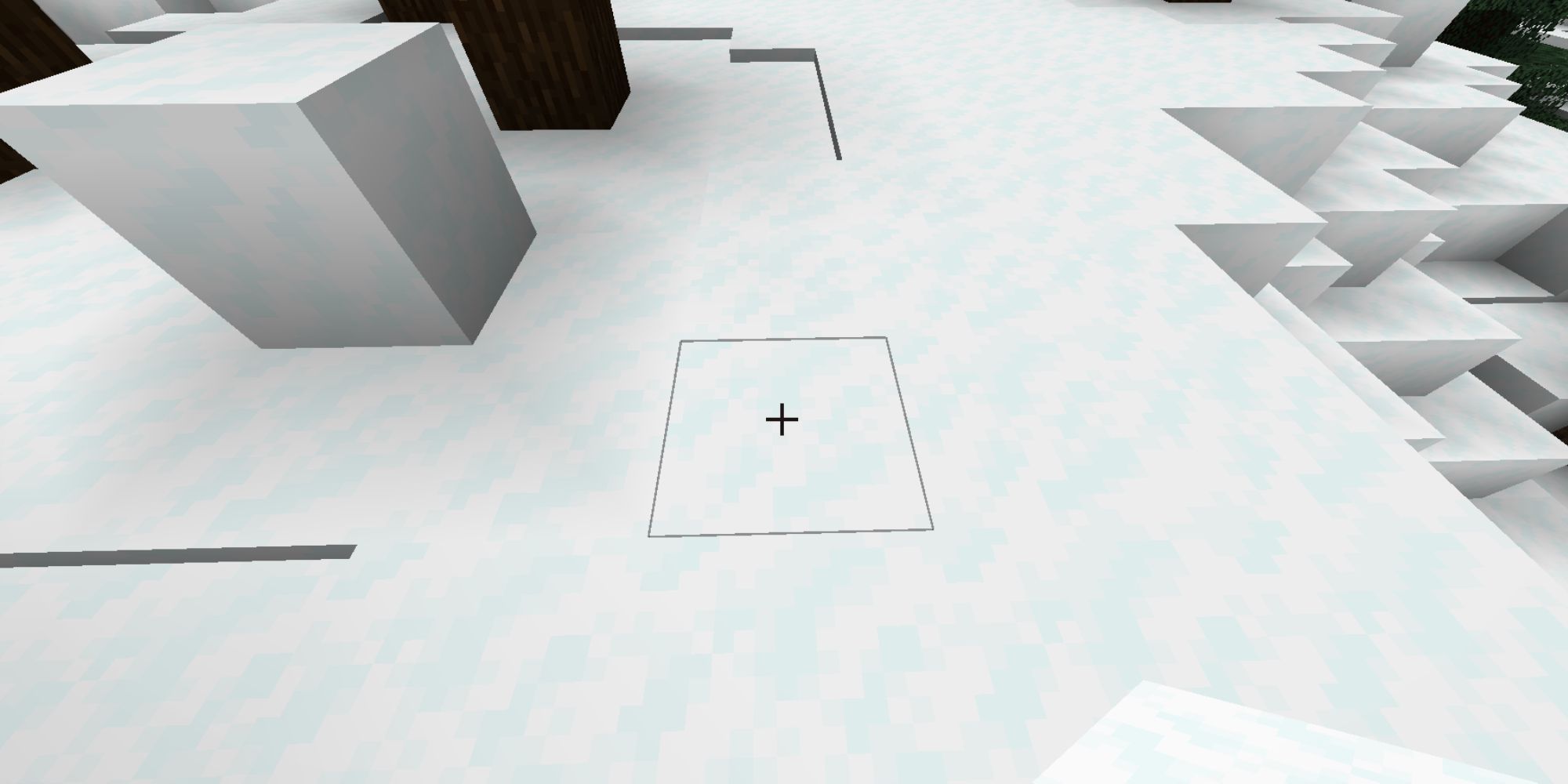 A player hovering their crosshair over a white snow block.